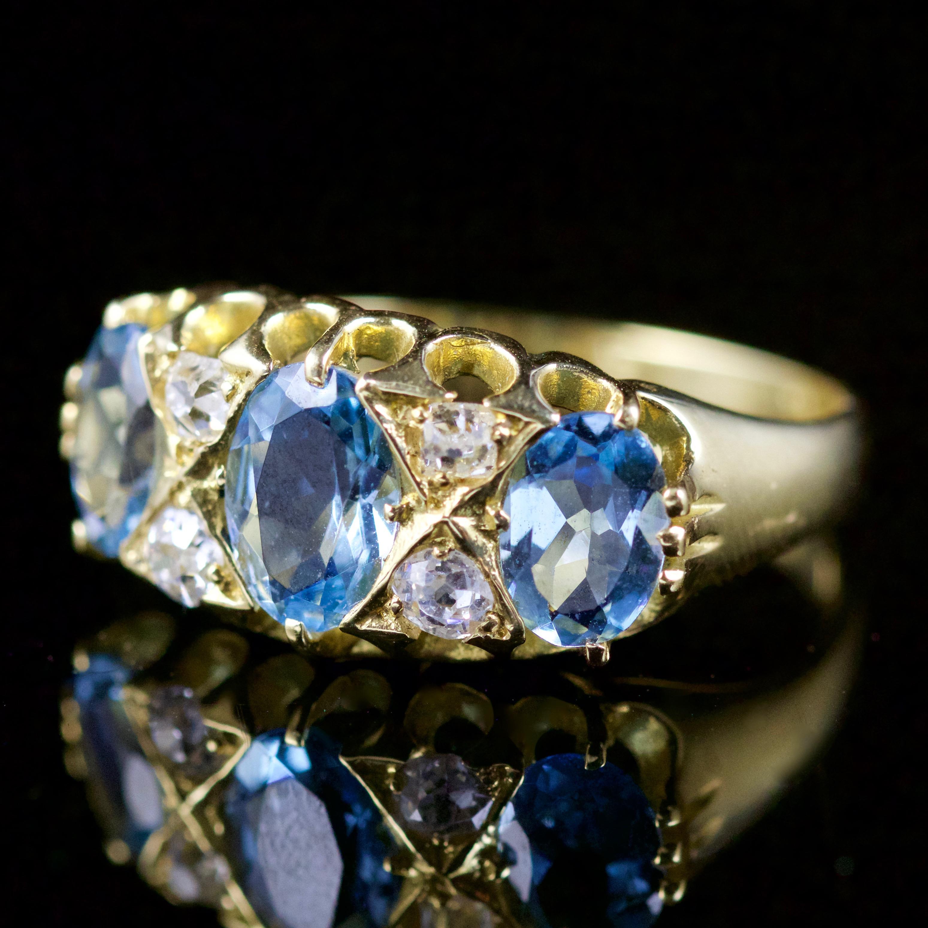 This Victorian Aquamarine and Diamond ring is set in 18ct Gold, Circa 1880.

Set with a trilogy of Aquamarines and smaller Diamonds nestled in-between.

The Diamonds are SI 1 H colour, and are truly beautiful.

Trilogy means past, present and future