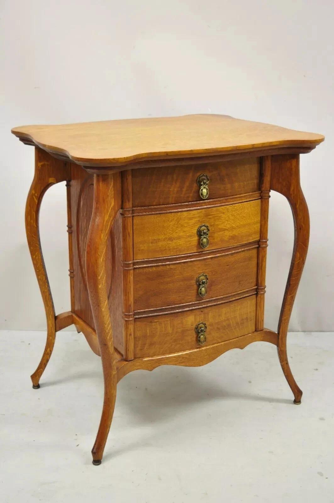 Antique Victorian Art Nouveau Golden Oak 4 Drawer Sewing Work Stand Side Table. Item features solid wood construction, beautiful wood grain, finished back, 4 dovetailed drawers, solid brass hardware, very rare antique item, quality American