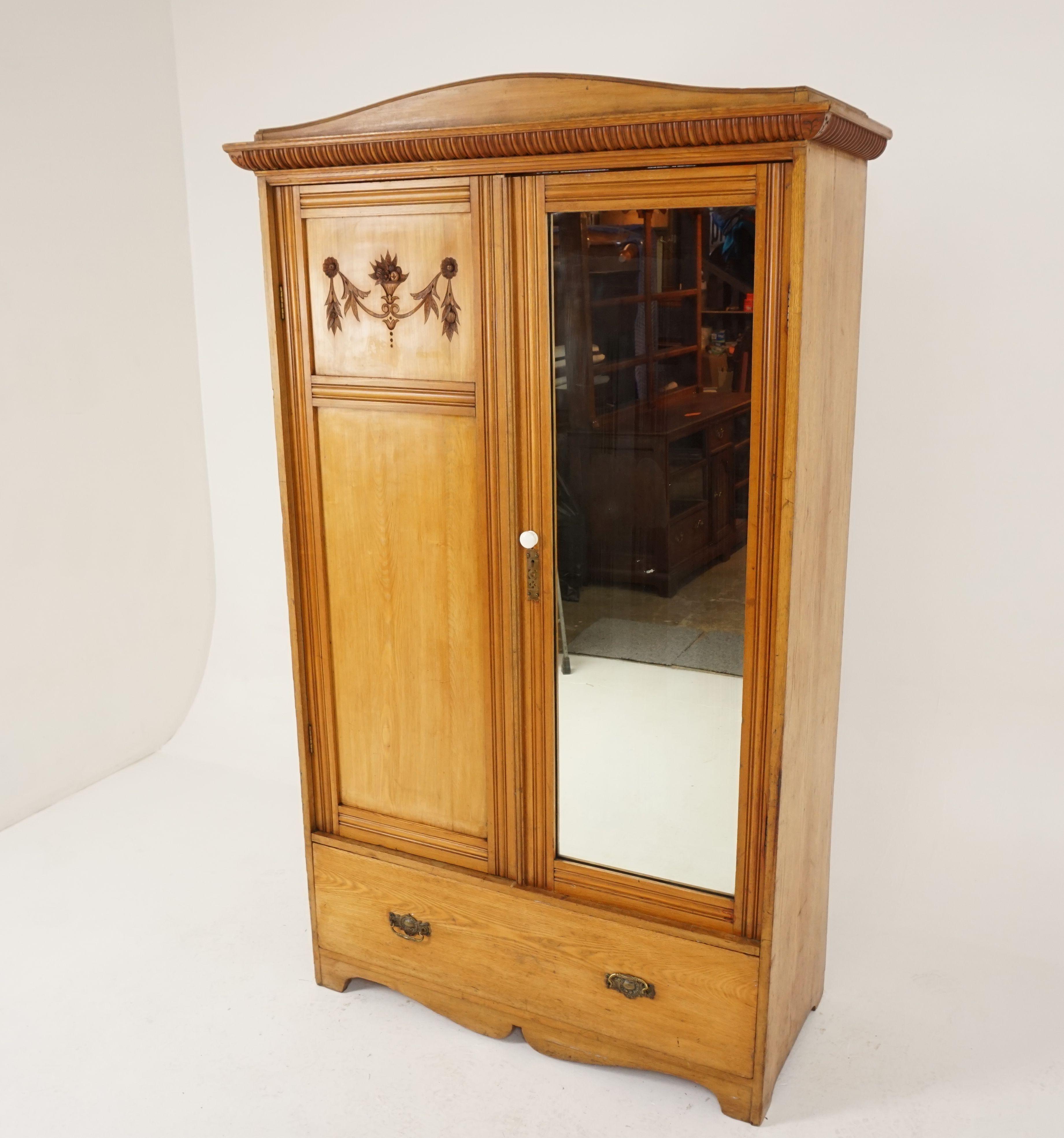 Antique Victorian ash armoire, wardrobe, closet, Scotland 1880, B2373

Scotland 1880
Solid oak
Original finish
Splayed moulded cornice with pediment to the top
Single mirrored door to the right
Carved paneled door to the left
Opens to reveal