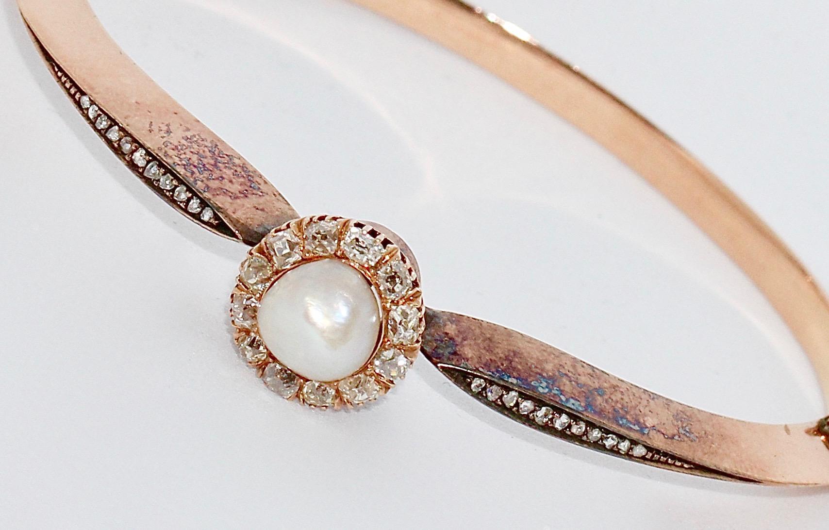 Antique Bangle, 14 Karat Gold, with Natural Pearl and Diamonds. 

Diameter of the pearl is about 7.5mm