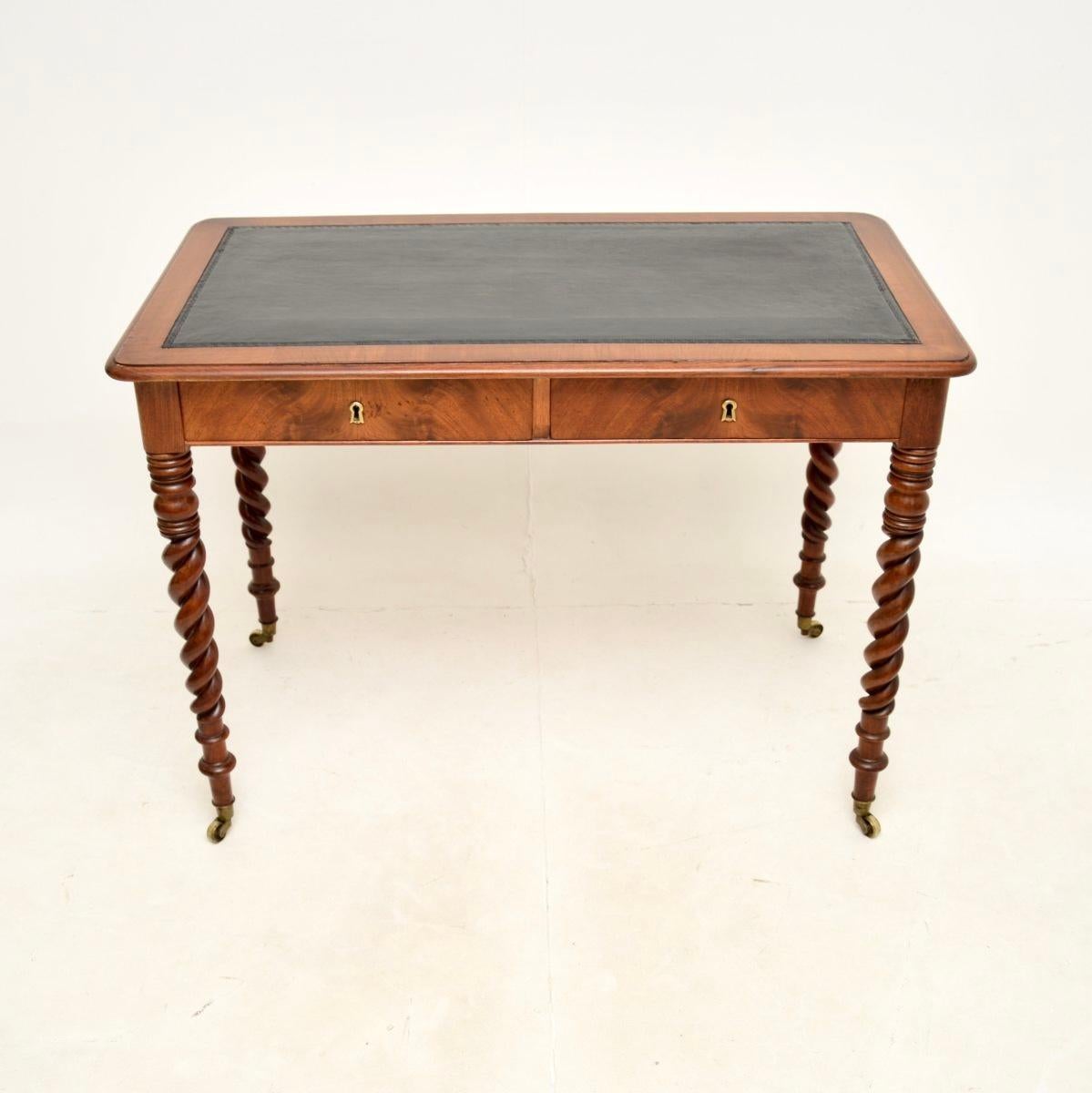A superb antique Victorian barley twist writing table / desk. This was made in Sweden, it dates from around the 1850-1860 period.

It is of extremely high quality, sitting on beautifully turned barley twist legs and brass casters. The drawers have
