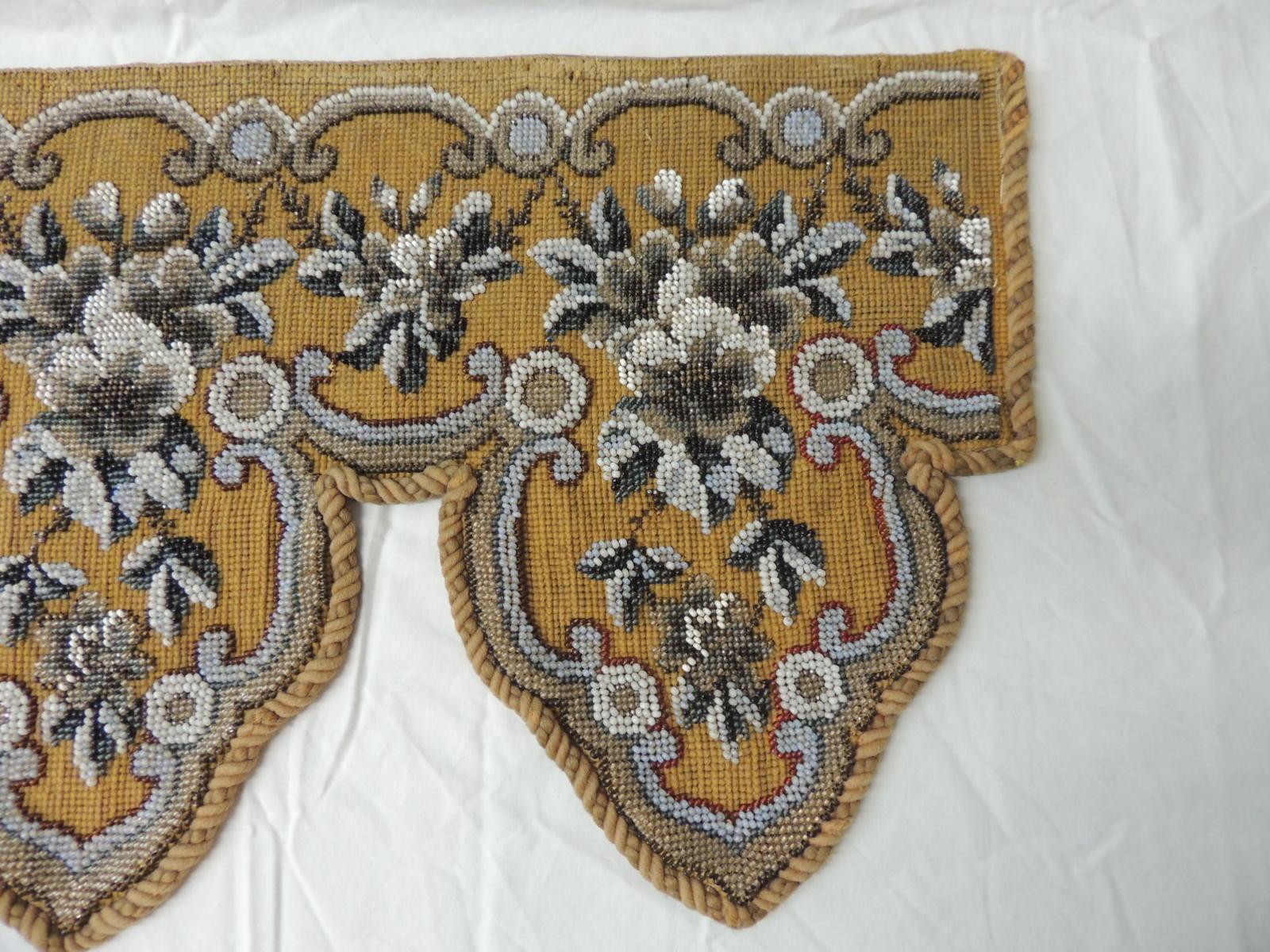 Gray white brown and gold glass beads embroidered on a tapestry and framed with antique rope trim.
One-of-the-kind tapestry.
Size: 50