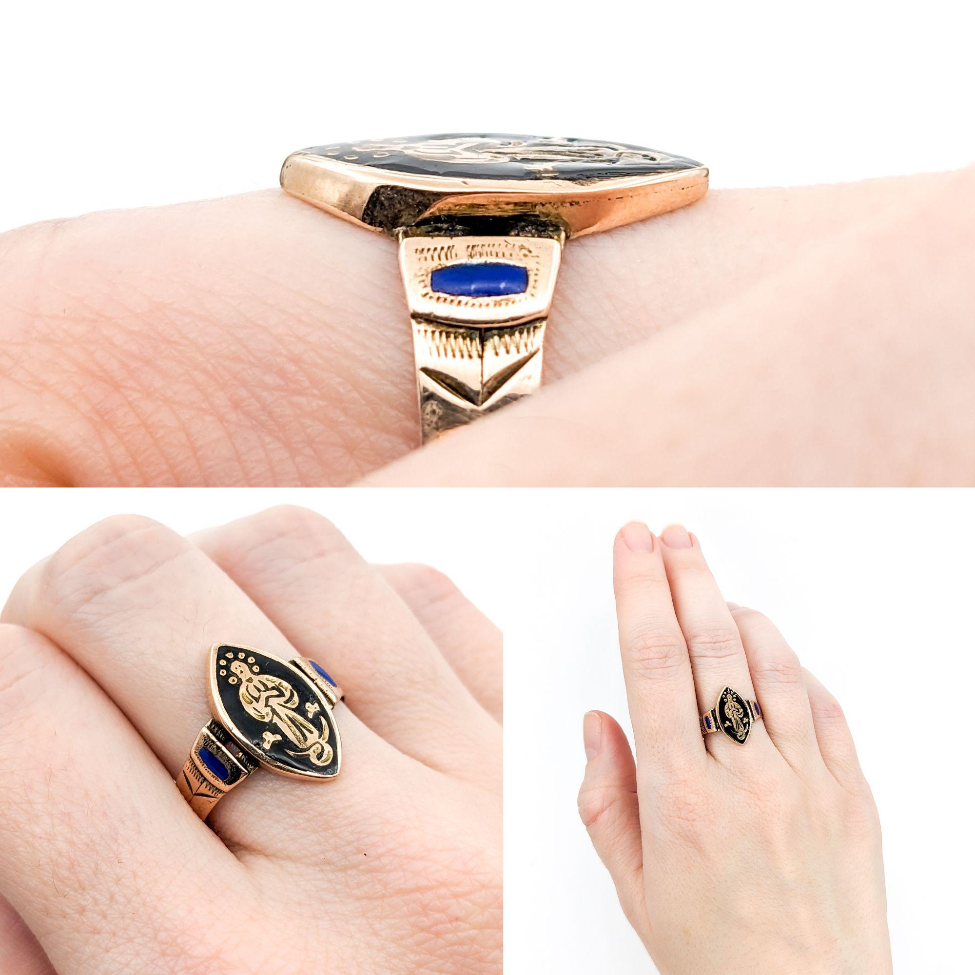 Antique Victorian Black Enamel Religious Saint Ring In Yellow Gold

This exquisite Antique Victorian Ring is beautifully crafted in 10k Yellow Gold. The highlight of this ring is its stunning centerpiece, a navette shaped face featuring a religious