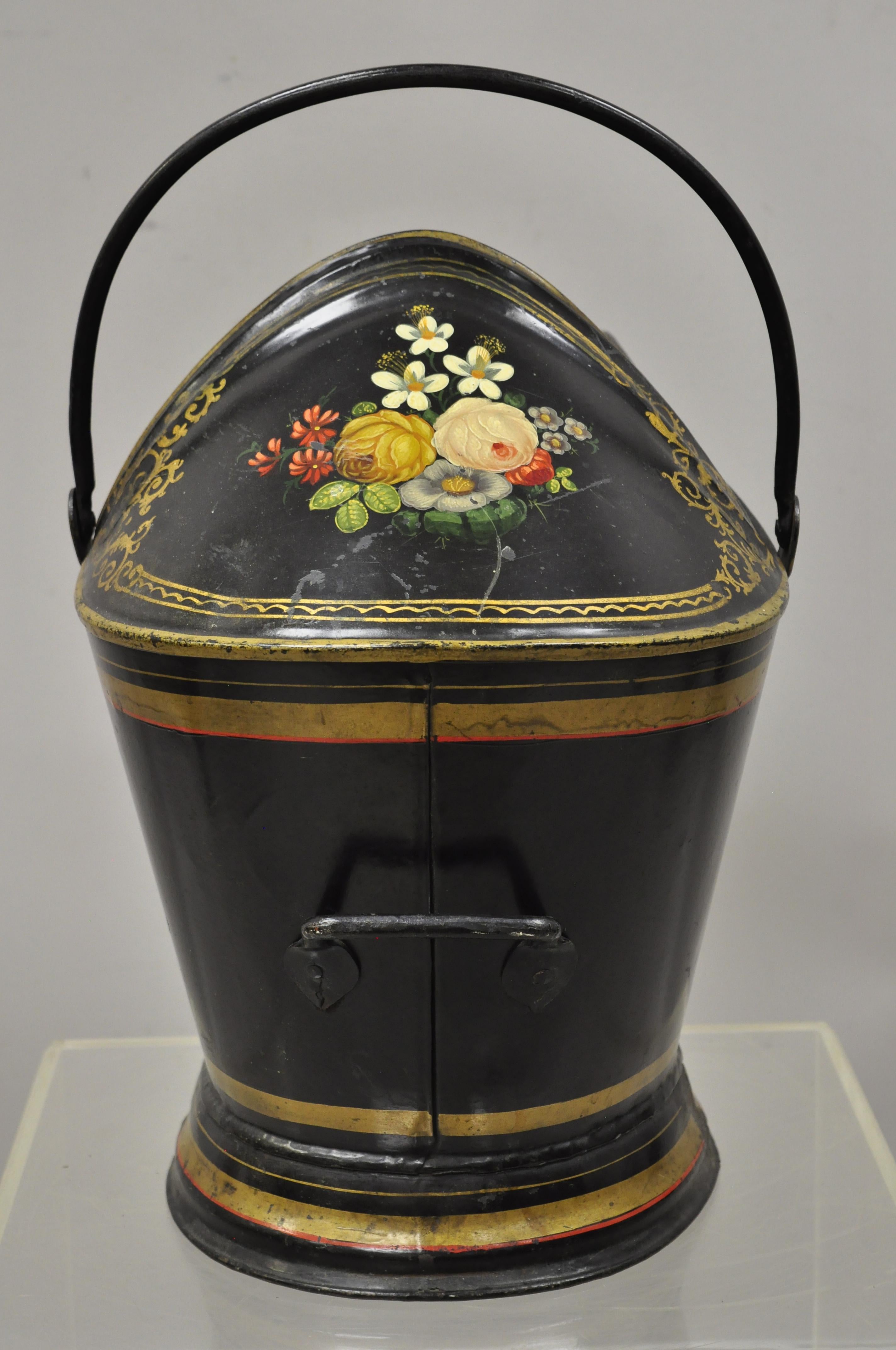 Antique Victorian black steel hand painted flower tole metal coal scuttle bucket. Item features hand painted flower details, steel metal construction, very nice antique item, circa late 19th-early 20th century. Measurements: 20