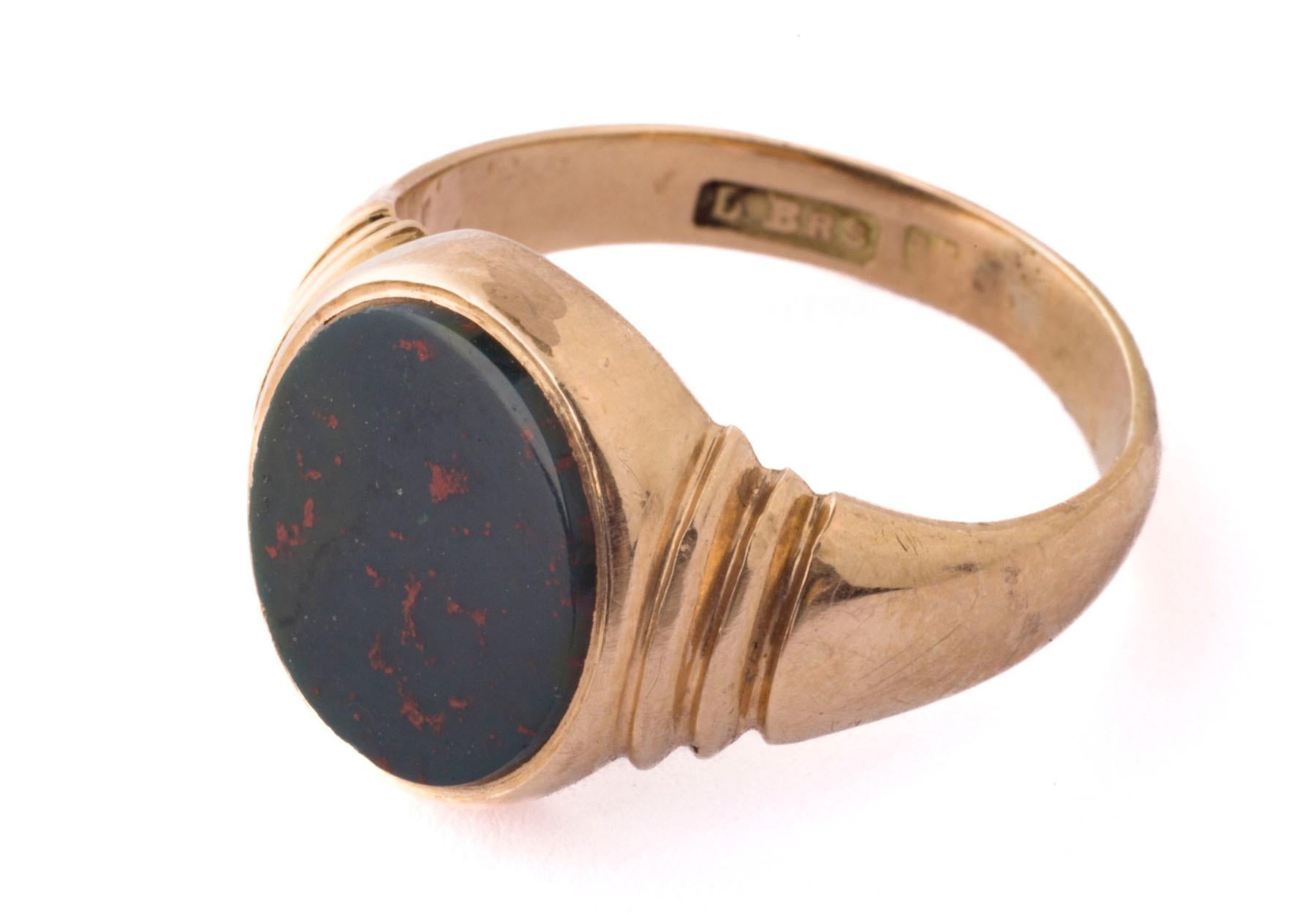 A clean 15kt gold signet ring that has not been engraved. This gives you the opportunity to engrave the stone to show your identity. The bloodstone has little red flecks that the photo does not show. The ring shaft shoulders are stunning. They are