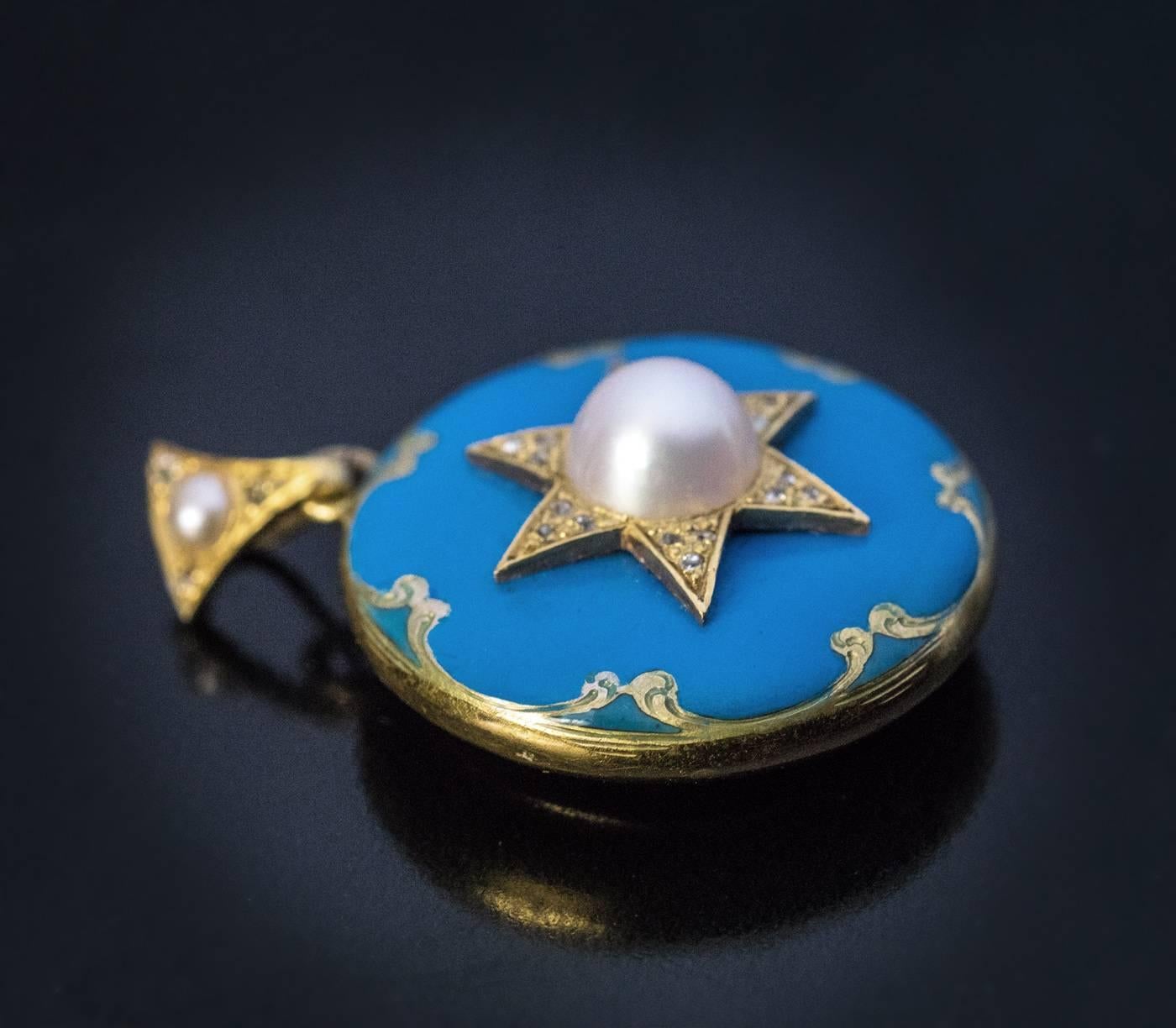 Circa 1870

An antique Victorian 14K gold star-motif locket pendant is embellished with glossy turquoise blue enamel, two half pearls, and tiny old mine cut diamonds. The back is set with a glazed compartment.

Diameter 25 mm (1 in.)

Sold without