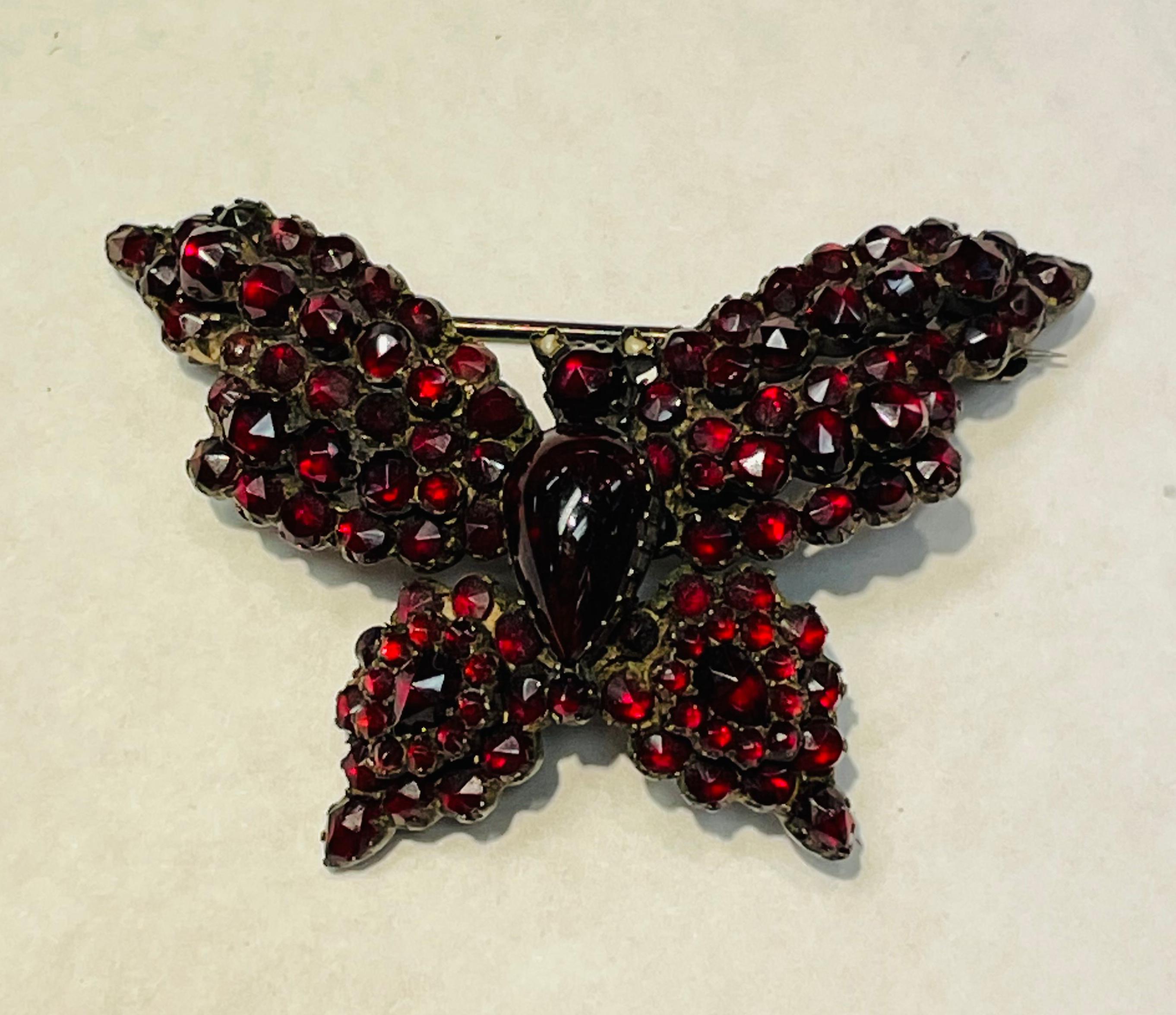 Antique Victorian Bohemian Garnet Brooch Pins Collection Estate Fine Jewelry
Fabulous Collection of 5 Antique Victorian Deep Red Garnet pins. Comprising of a Butterfly, Bird, Crescent Moon and Star and 2 Cluster pins. Hand set with Pyrope Garnet