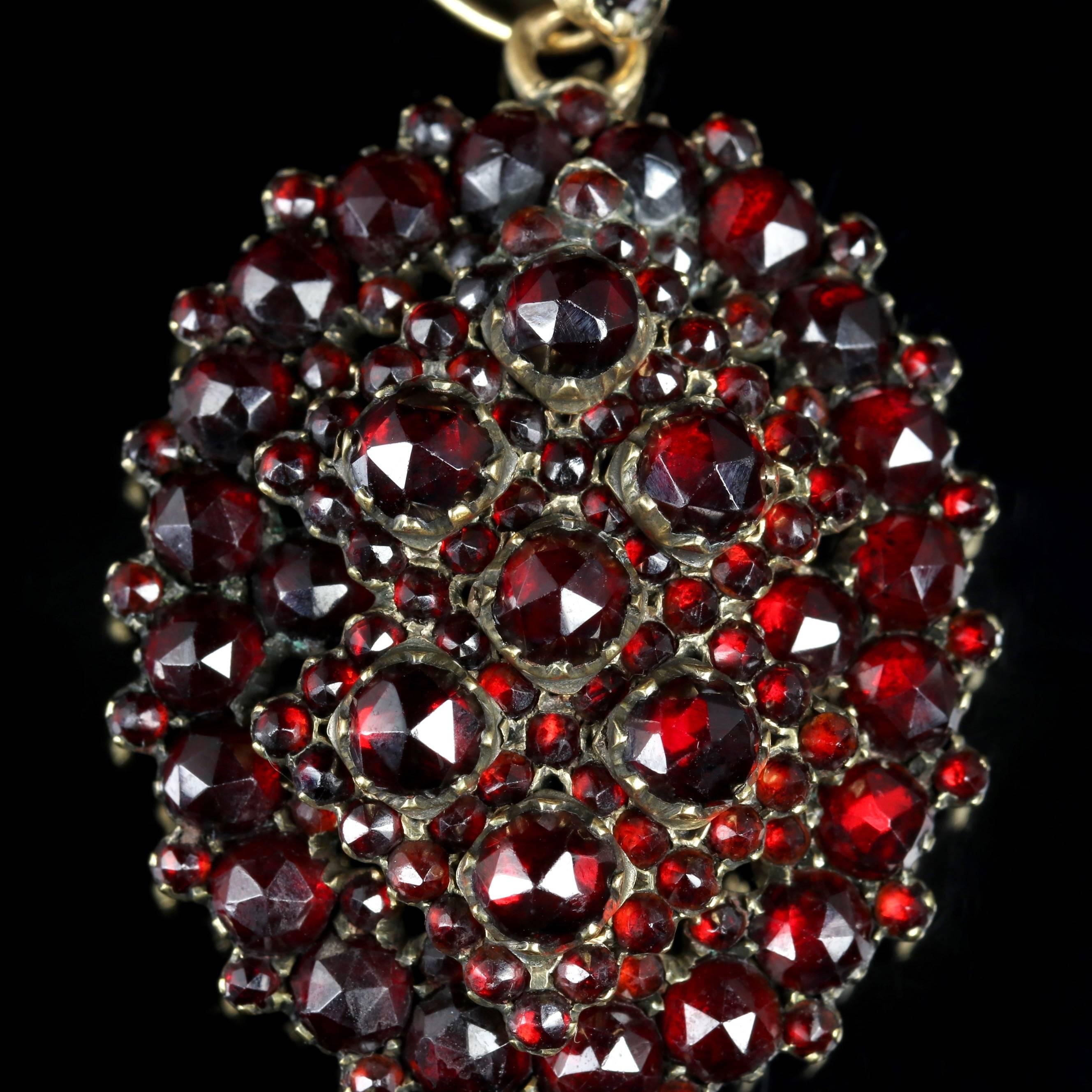 This superb Victorian Bohemian Garnet locket is Circa 1880. 

The locket is adorned with a cluster of deep red Bohemian Garnet’s set in a beautifully designed Garnet Gold gallery. 

Set in 18ct gilded on Garnet Gold.

Bohemian Garnets are a small