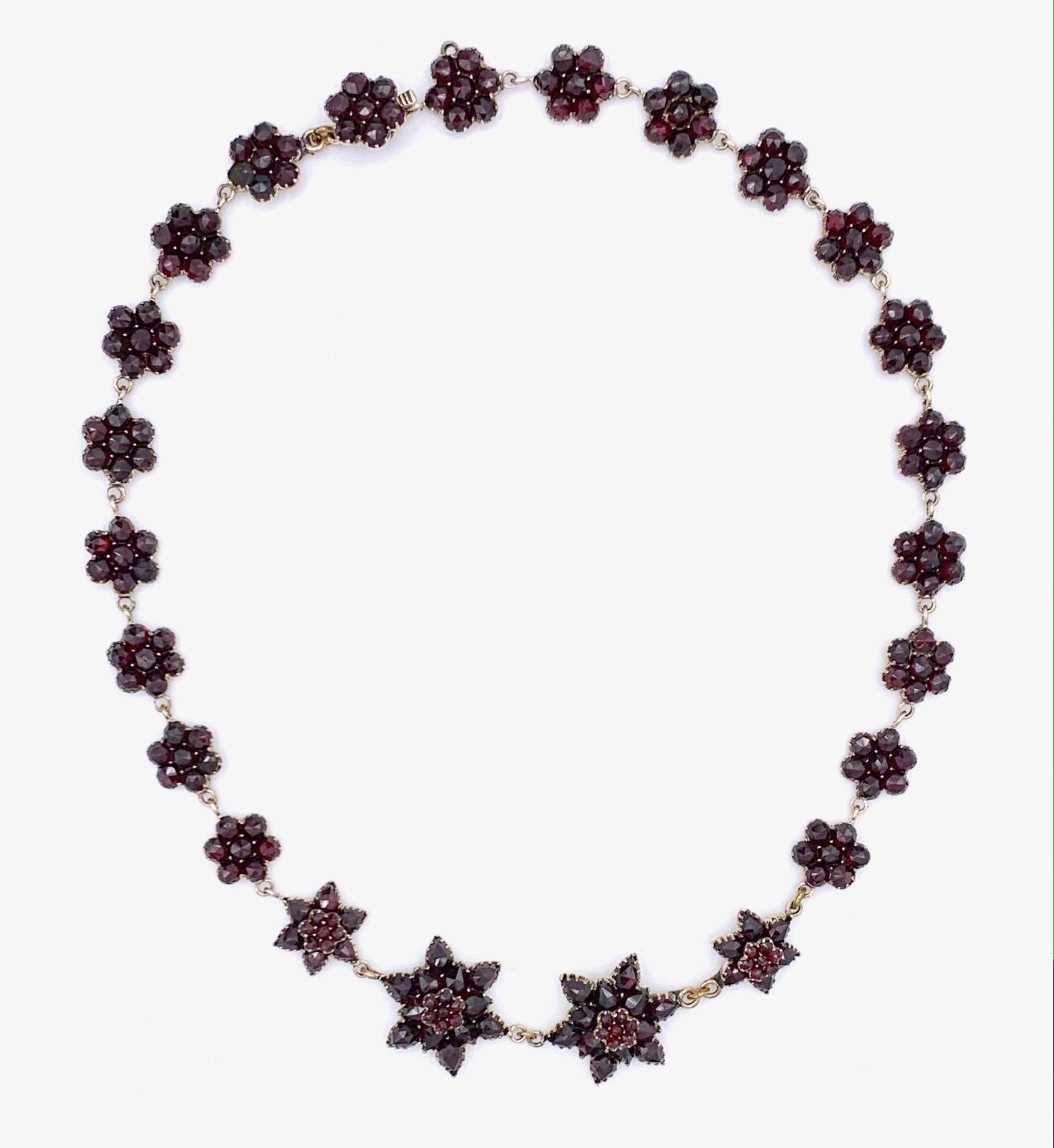 This timeless lovely garnet necklace dates from the 1880' with the star motif so popular in this decade.