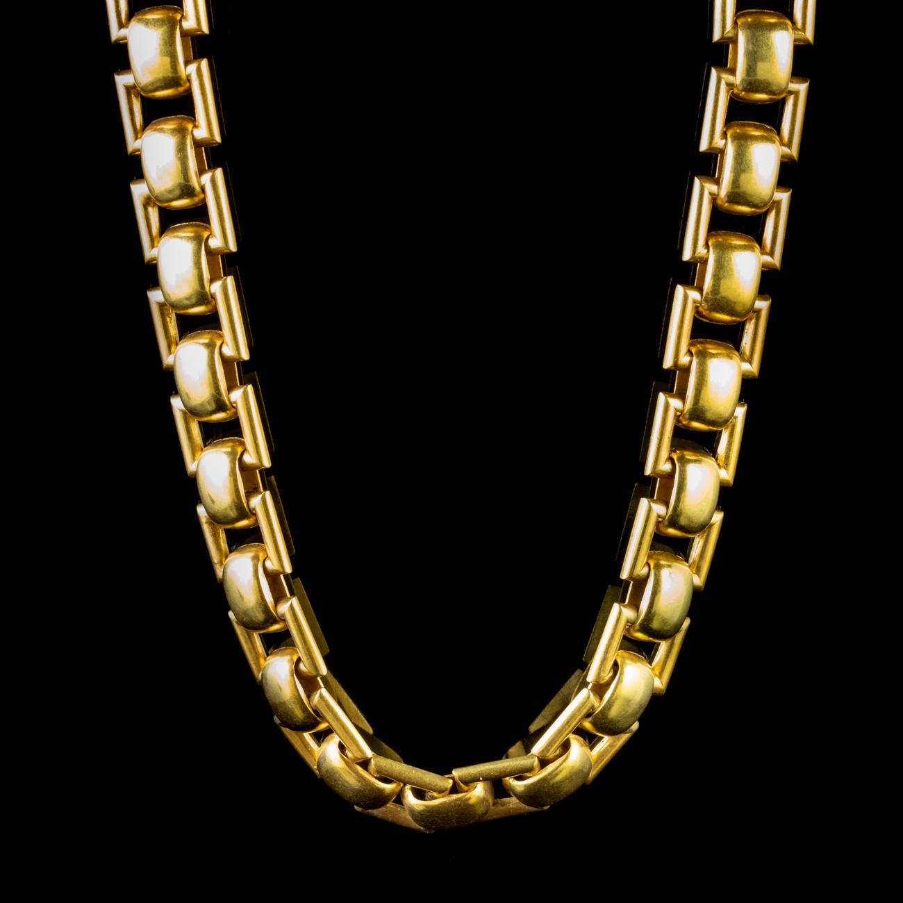 This stunning Victorian book collar link chain is crafted in Silver and gilded in 18ct Yellow Gold. 

The alternating square and curved links shine brightly, and interlock to form a smooth back which makes it extremely comfortable when worn. The
