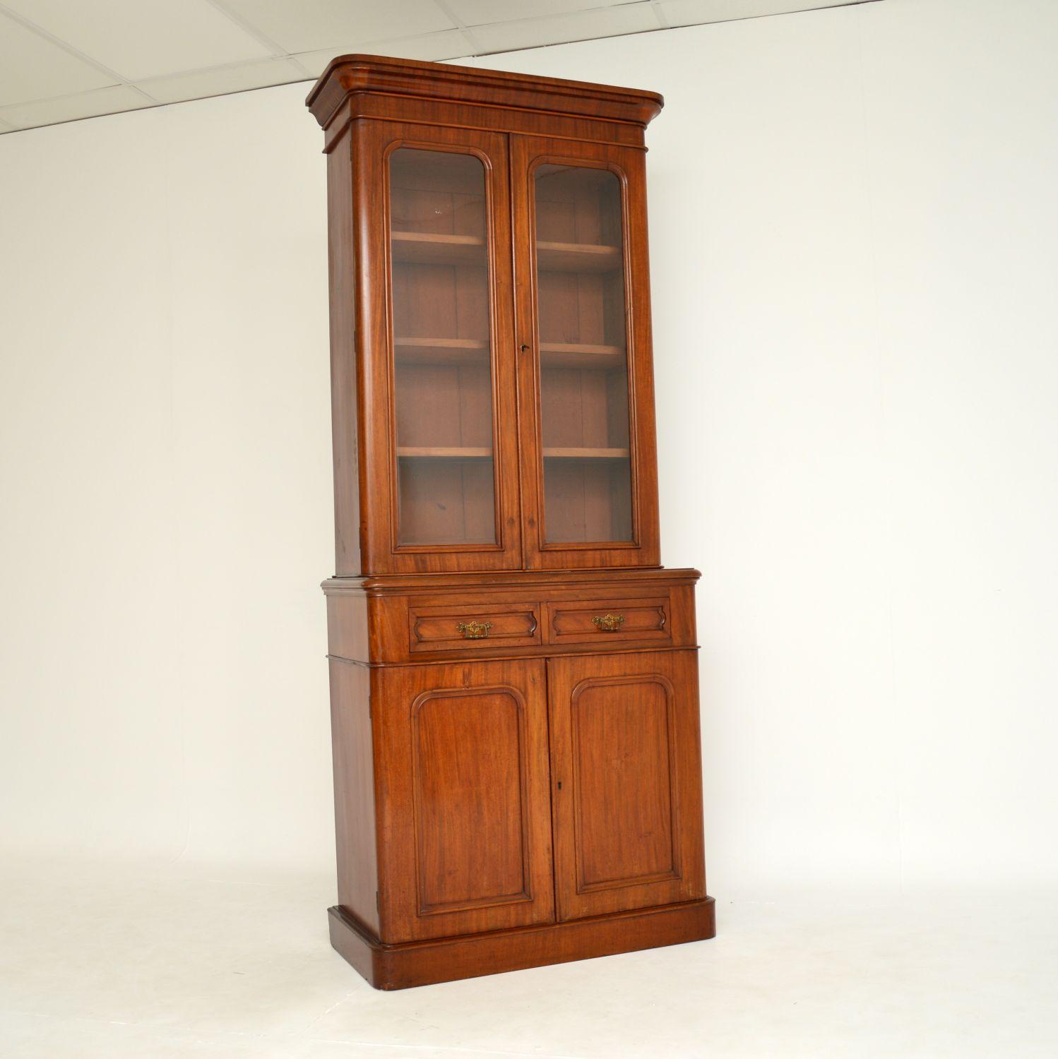 An excellent antique Victorian bookcase. This was made in England, it dates from around the 1860-1880 period.

It’s a great size, very tall and slim, with lots of storage space. The quality is very good, this is well made, sturdy and sound.

The