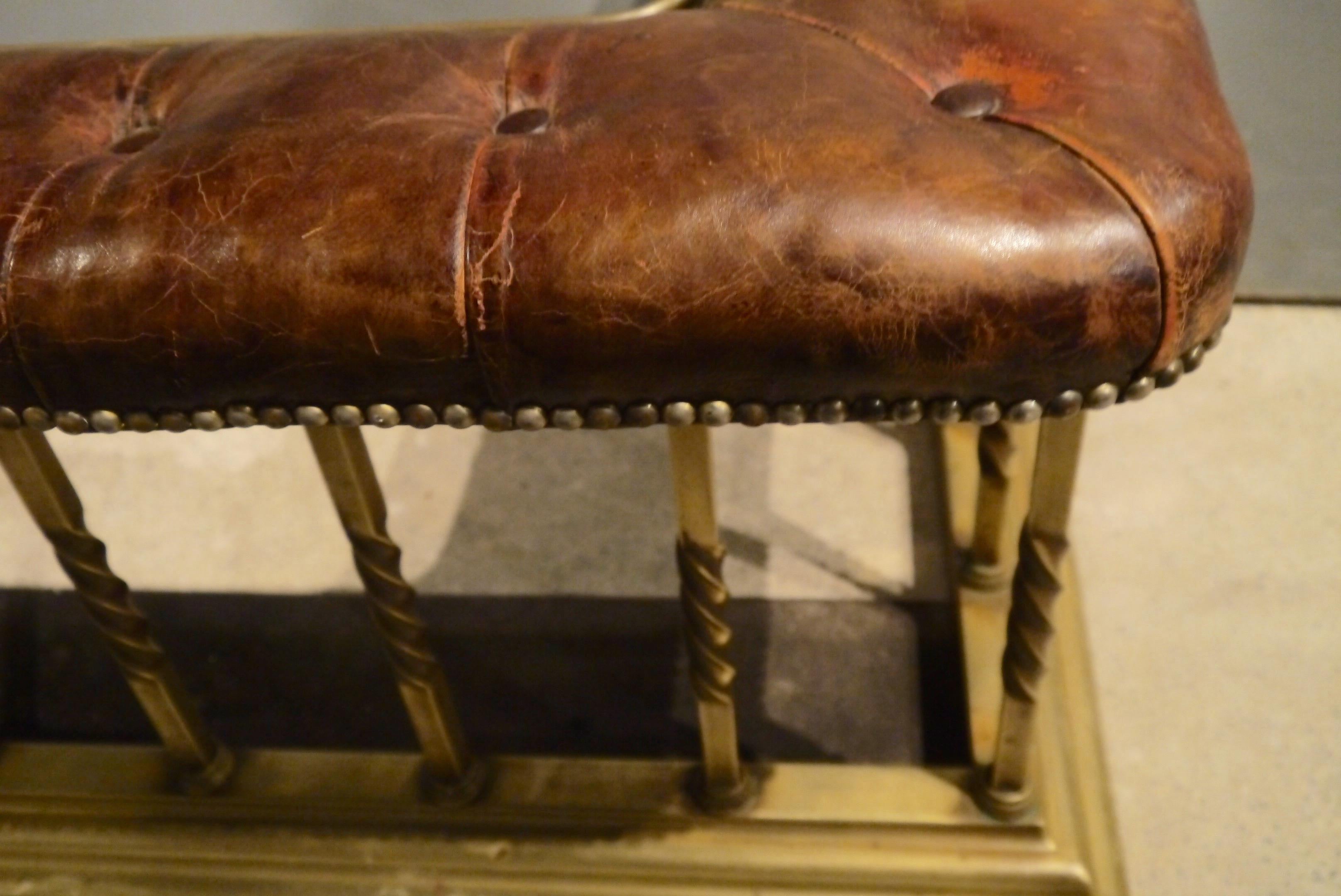 Original Victorian brass and brown leather club fender for mantel pieces.