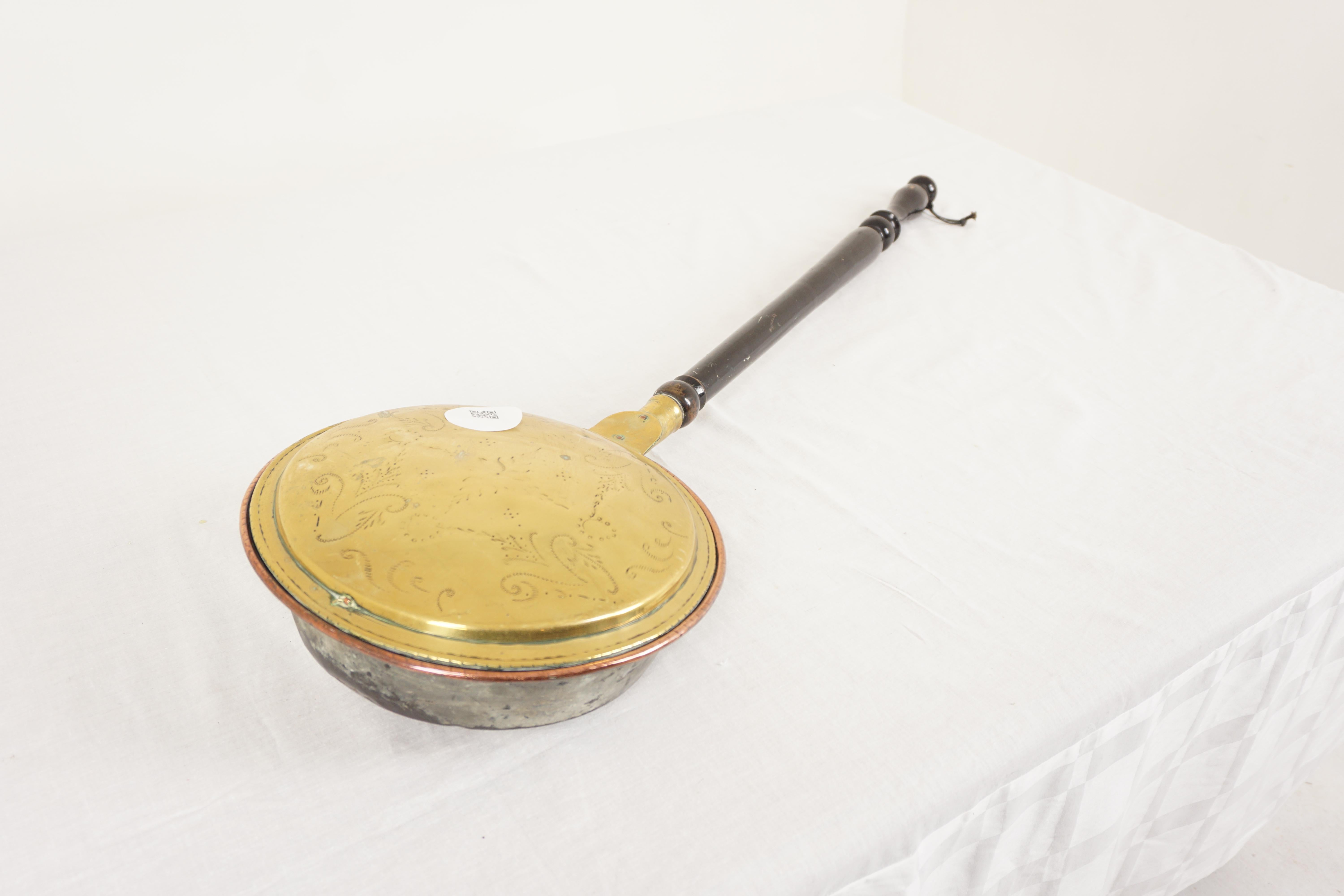 Antique Victorian brass bed warmer, bed pan, Scotland 1880, H1139

Scotland 1880
Solid Brass
Original Finish
Turned wooden handle
Embossed top brass lid opens to reveal interior which will hold warms coals
These were used to warm the inside