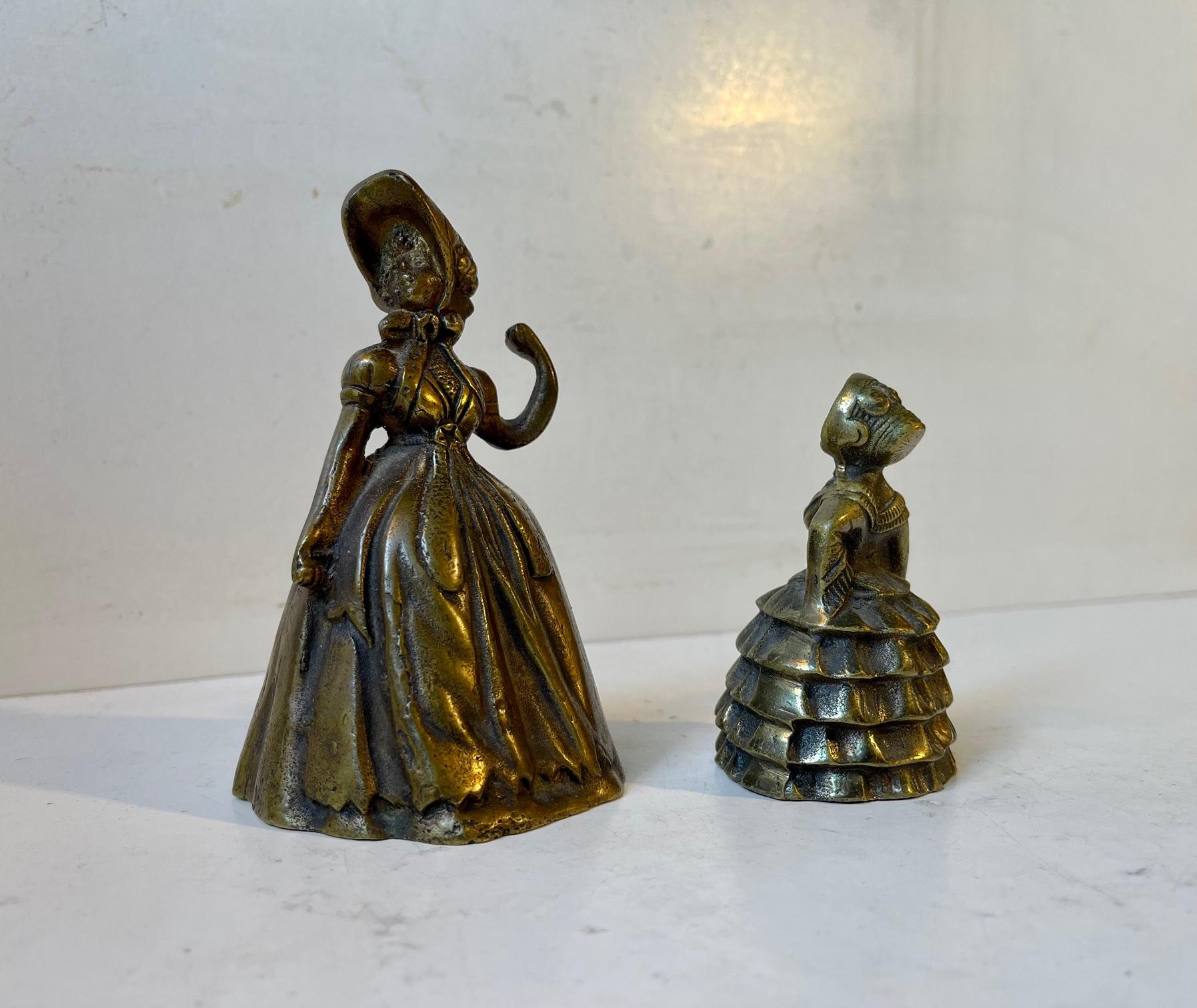 brass lady bells history