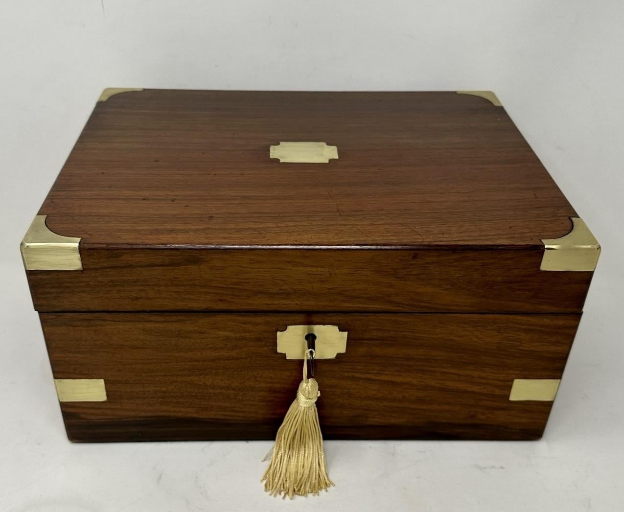 An exceptionally fine early English Well Figured Solid grained Mahogany Ladies or Gents Travelling Writing Slope of outstanding quality and compact proportions. Last quarter of the 19th century. 

The hinged lid opening to reveal a stunning