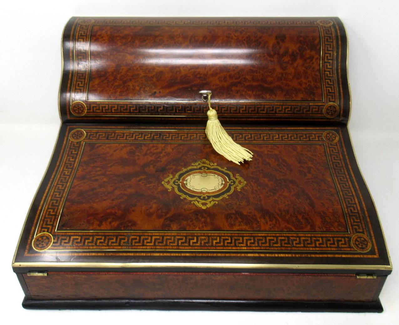 An exceptionally fine quality French or English well figured solid burr walnut and ebony ladies or gents travelling writing slope of outstanding quality and of generous proportions. Last quarter of the nineteenth century, possibly earlier.
The