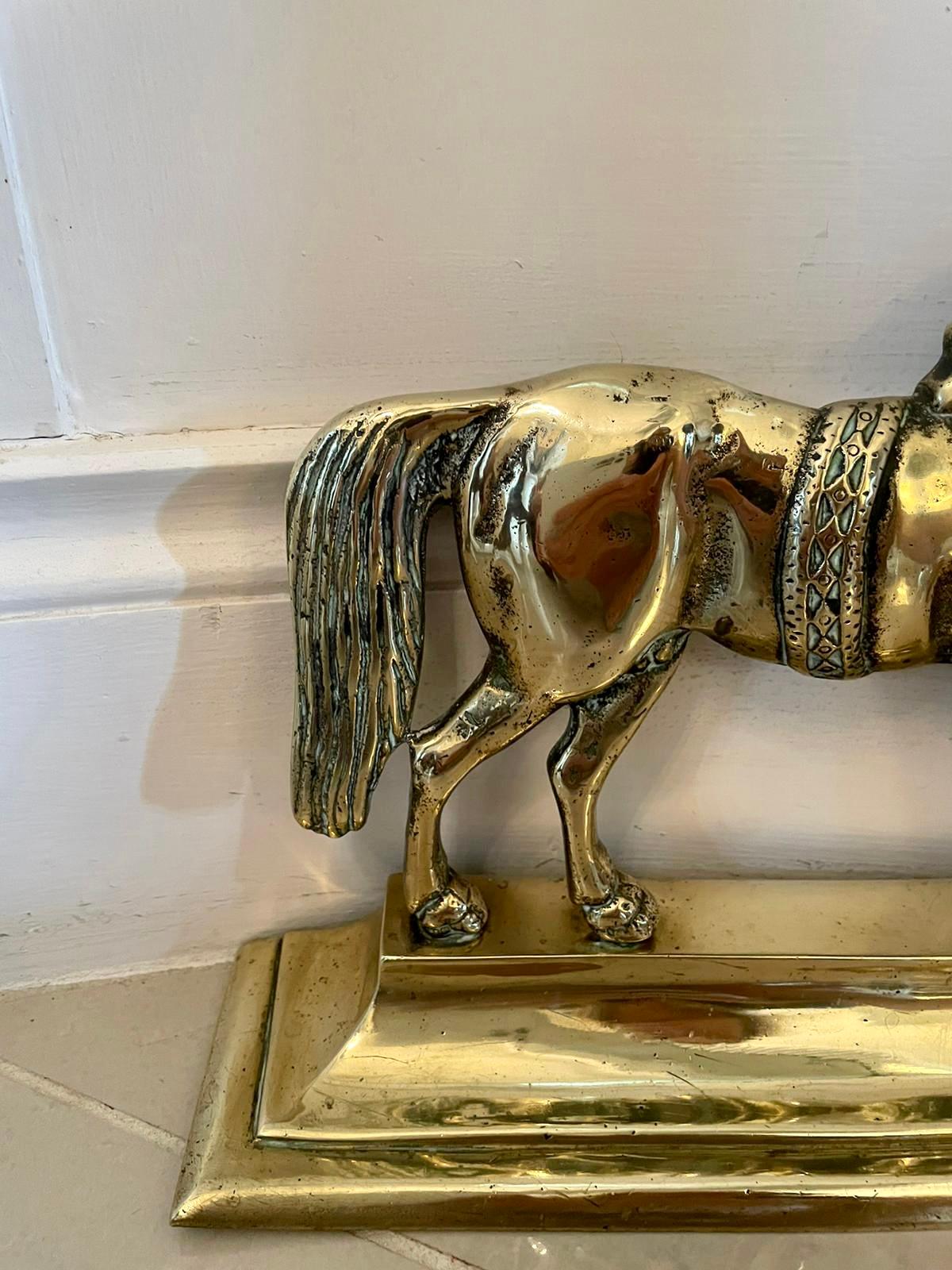 Antique Victorian brass doorstop depicting a magnificent solid brass model of an elegant horse standing on a shaped brass moulded base.

In delightful original condition.

Measures: H 21cm
W 29.5cm
D 8cm
1880.

  