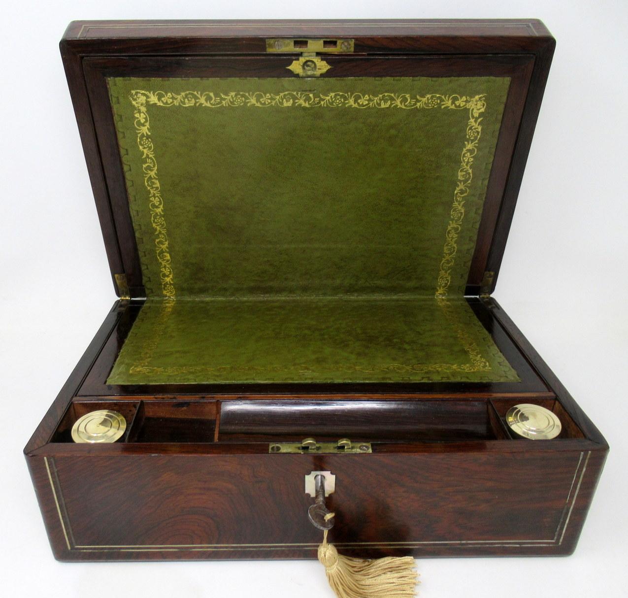 An Exceptionally Fine Quality English well figured solid burr walnut ladies or gents travelling writing slope of outstanding quality and generous proportions. Third quarter of the Nineteenth Century. 

The hinged lid opening to reveal a fitted