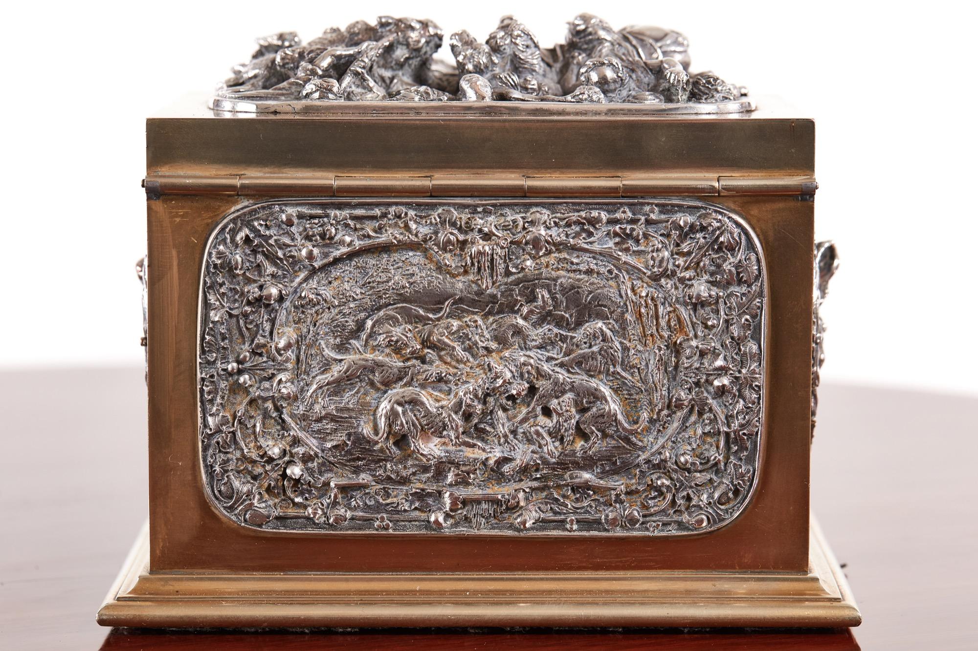 Fine antique Victorian brass and silver plated tea caddy with magnificent silver plated panels and stunning hunting scenes. It has silver plated end panels with delightful cherubs, inside are two beautifully engraved oval silver plated tea caddies.