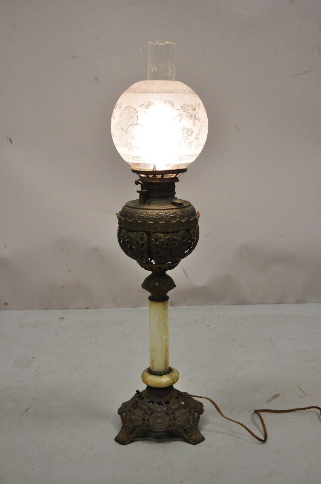 Antique Victorian Bronze Converted Oil Lamp Table Lamp Alabaster Shaft. item features alabaster shaft, pierce decorated bronze, glass shade with floral decoration and glass chute, very nice antique item. Circa 19th Century. Measurements: 31