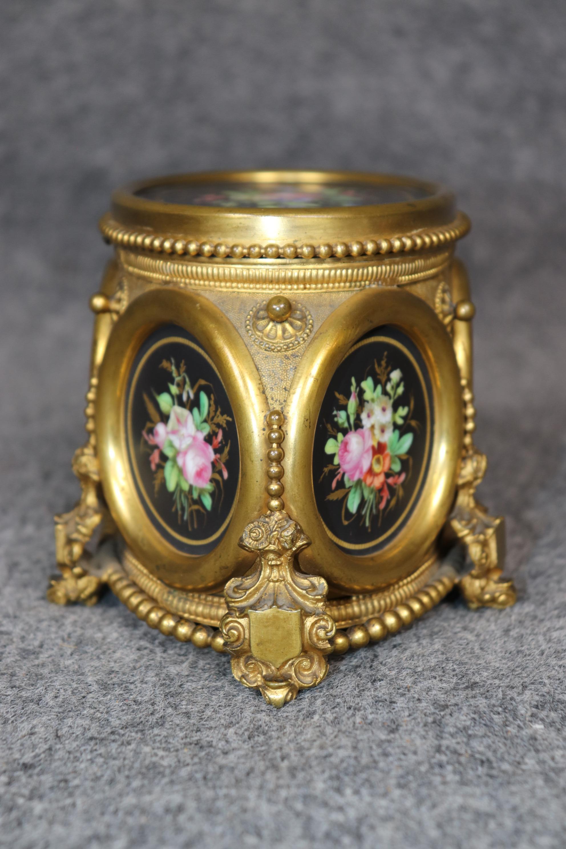 
This antique 19th century Victorian bronze ormolu jewelry casket is made of the highest quality! Made in the late 1800's, this petite jewelry box perfect for storing away any precious jewelry or small object.  If you look at the pictures provided,