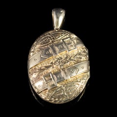 Antique Victorian Buckle Forget Me Not Locket 9 Carat Gold, circa 1900