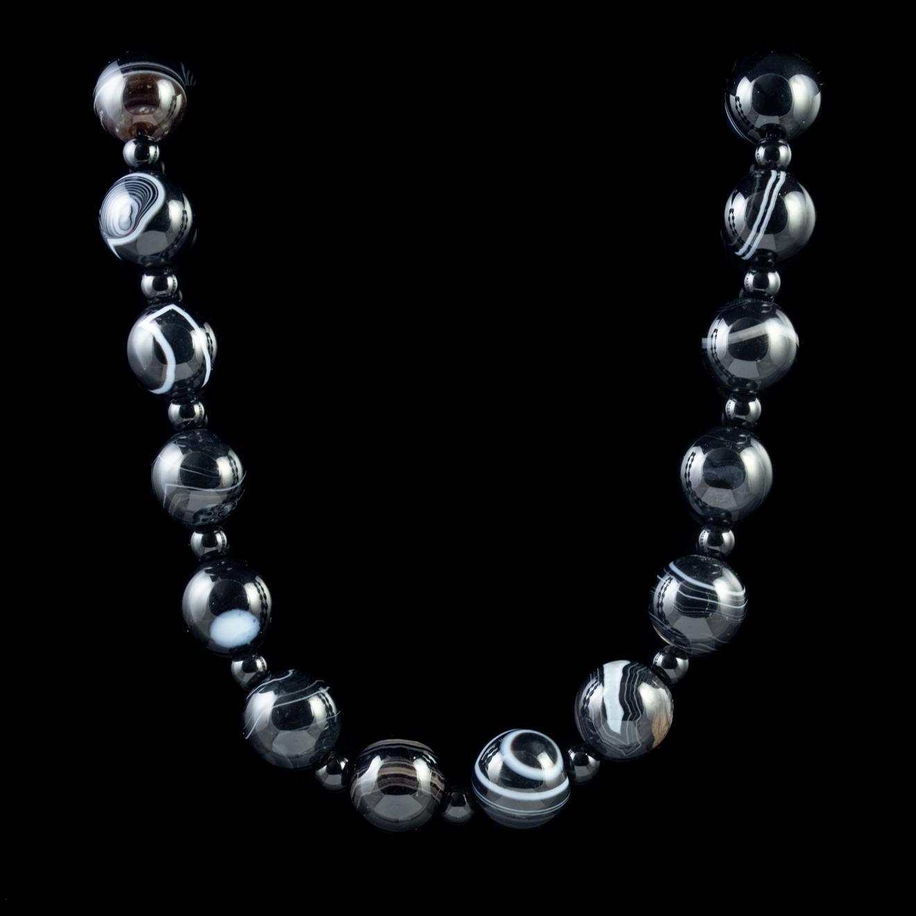 A lovely Antique Victorian necklace made up of spellbinding Bullseye Agate beads which have been polished to perfection with a lovely smooth touch. 

The Agates are a wonderful deep black colour and known as Bullseye Agates for their multiple white