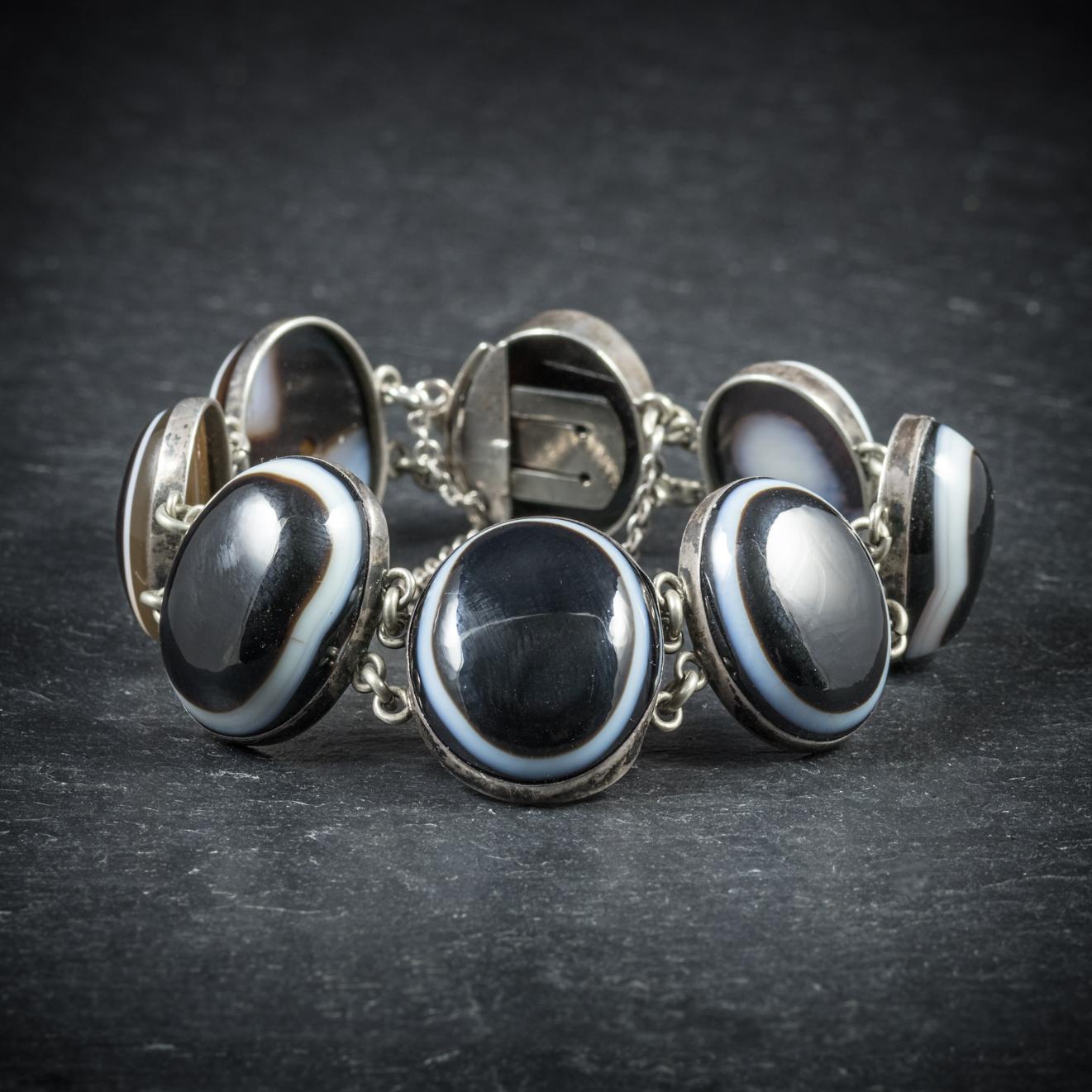 This beautiful antique Bullseye Agate bracelet is Victorian, Circa 1900

The bracelet comprises of eight polished Bullseye Agates which are smooth to the touch and have beautiful patterning 

All set in Silver and complete with a secure clasp and