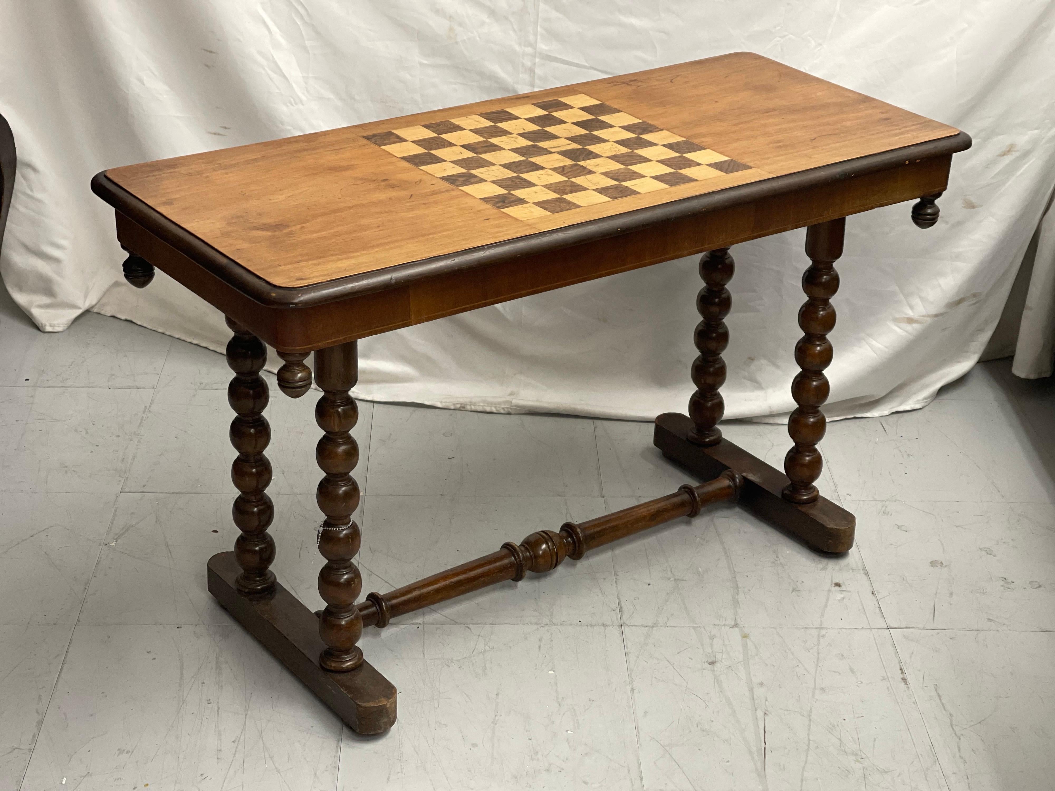 Original Victorian circa 1860-1880 burr walnut chess games table with Bobbin turned base A well made table, it can be used as an occasional table or for chess as intended, the materials used are very decorative and it could be considered art