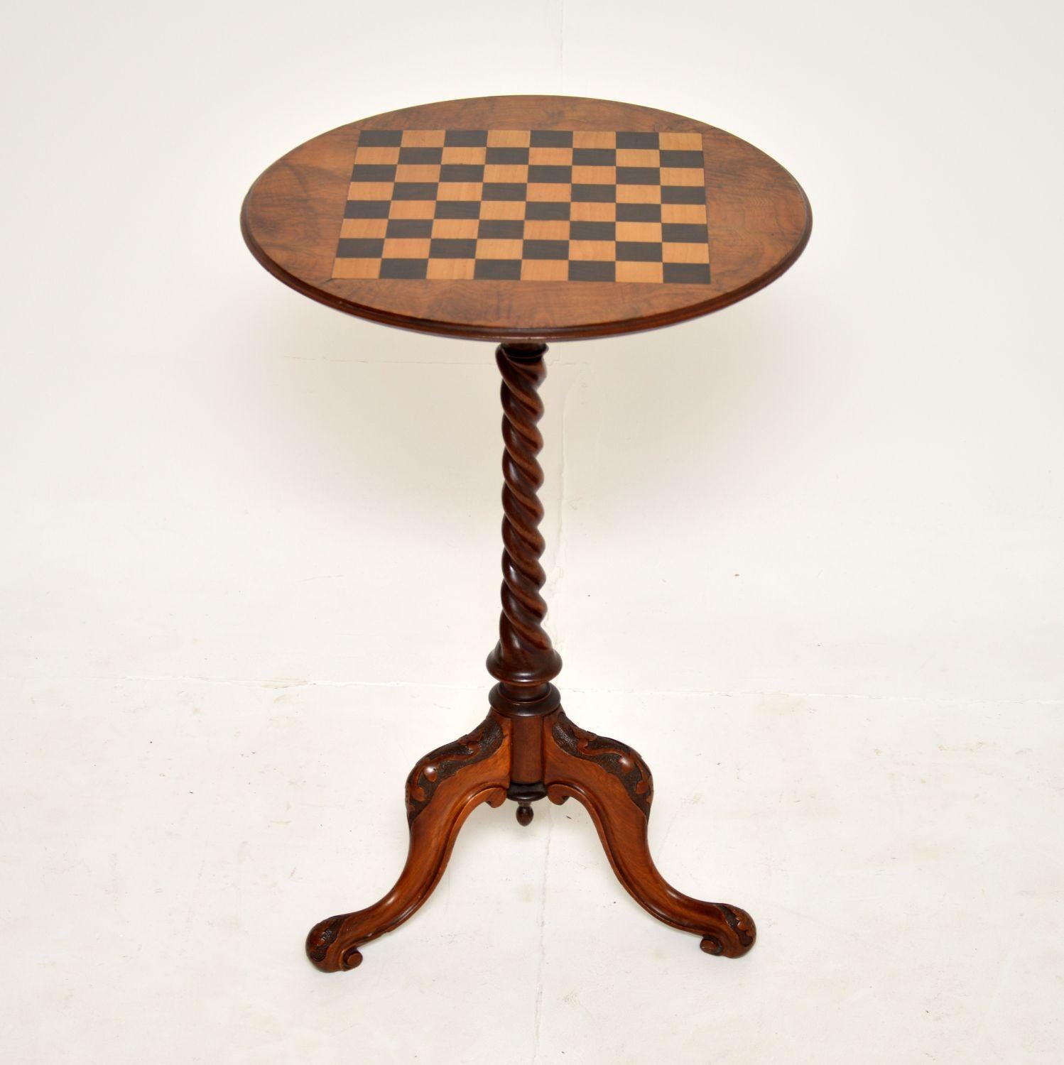 A fantastic antique Victorian chess table in walnut. This was made in England, it dates from around the 1860-1880’s period.

It is beautifully made, the top has an inlaid chessboard made from sycamore and mahogany, the other edges are burr walnut.