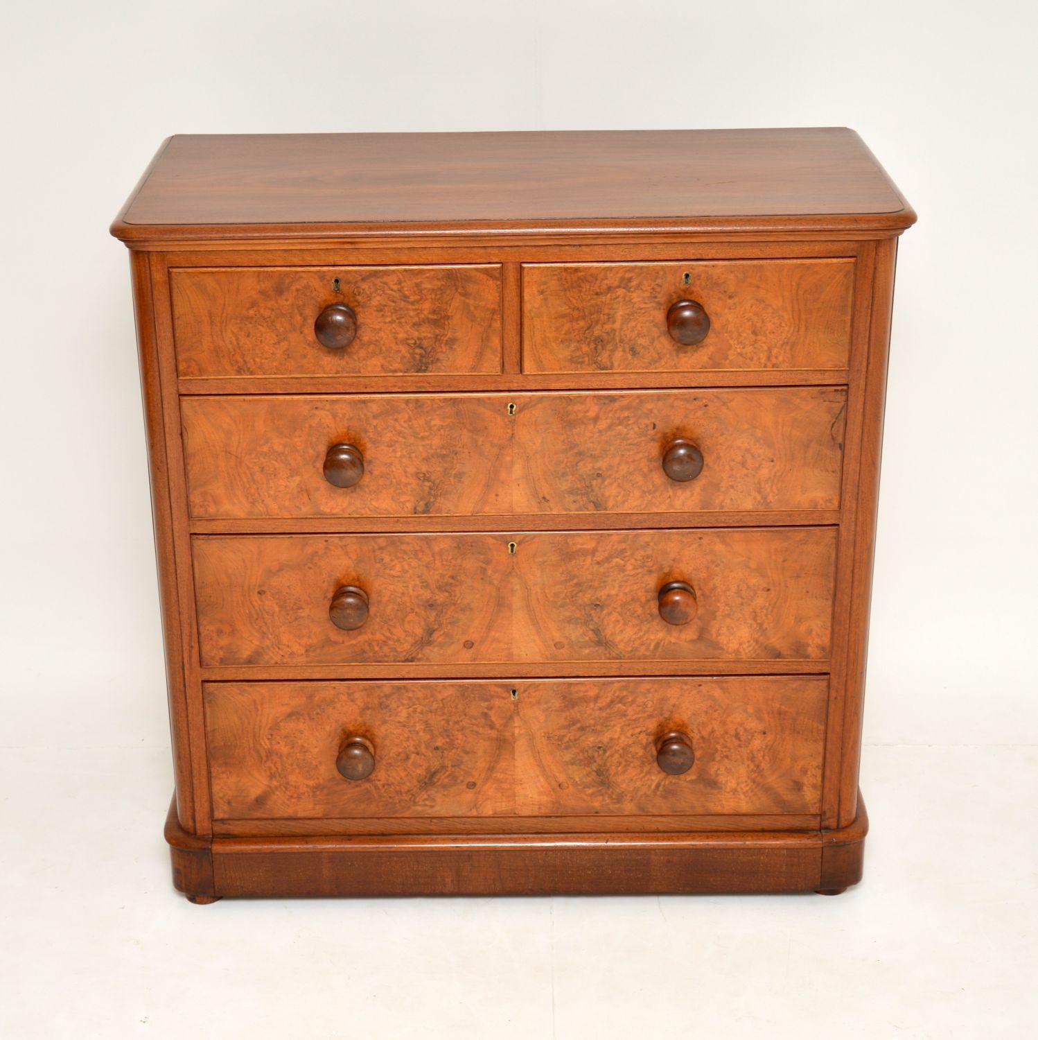 This antique Victorian burr walnut chest of drawers is a very fine example of this kind of model and has a lovely warm mellow color. The pattern of the burr walnut running through all the drawers is beautiful and the overall quality is