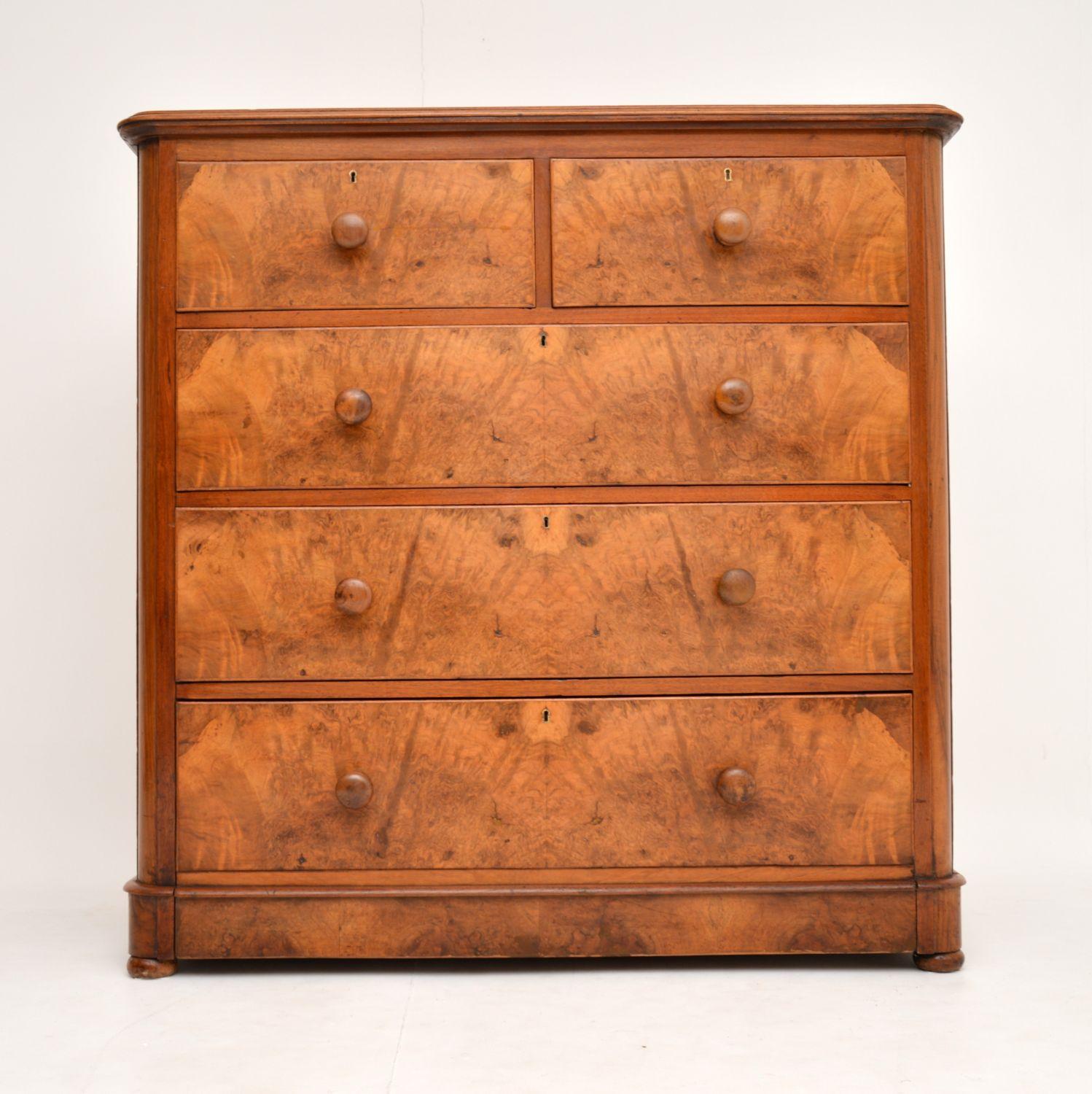 Large antique Victorian burr walnut chest of drawers of extremely fine quality, with a beautiful color, dating to circa 1860s period.

It has a solid walnut top, rounded corners and very deep drawers. The bottom drawer is extra deep, as it is