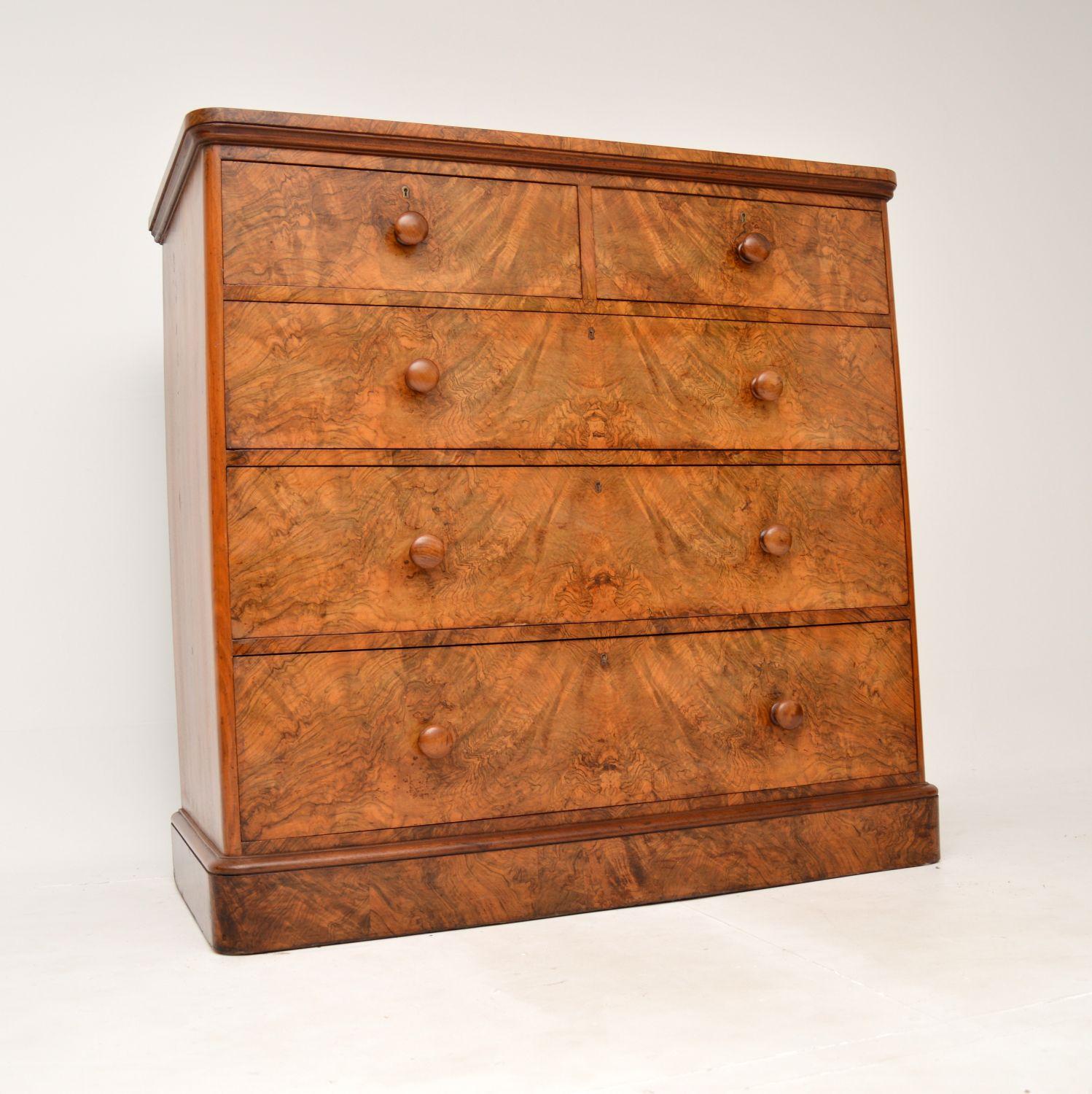 A superb antique Victorian chest of drawers in walnut. This was made in England, it dates from the 1860-1880’s.

It is large and very impressive, the quality is outstanding. There are stunning burr walnut grain patterns throughout, even the plinth