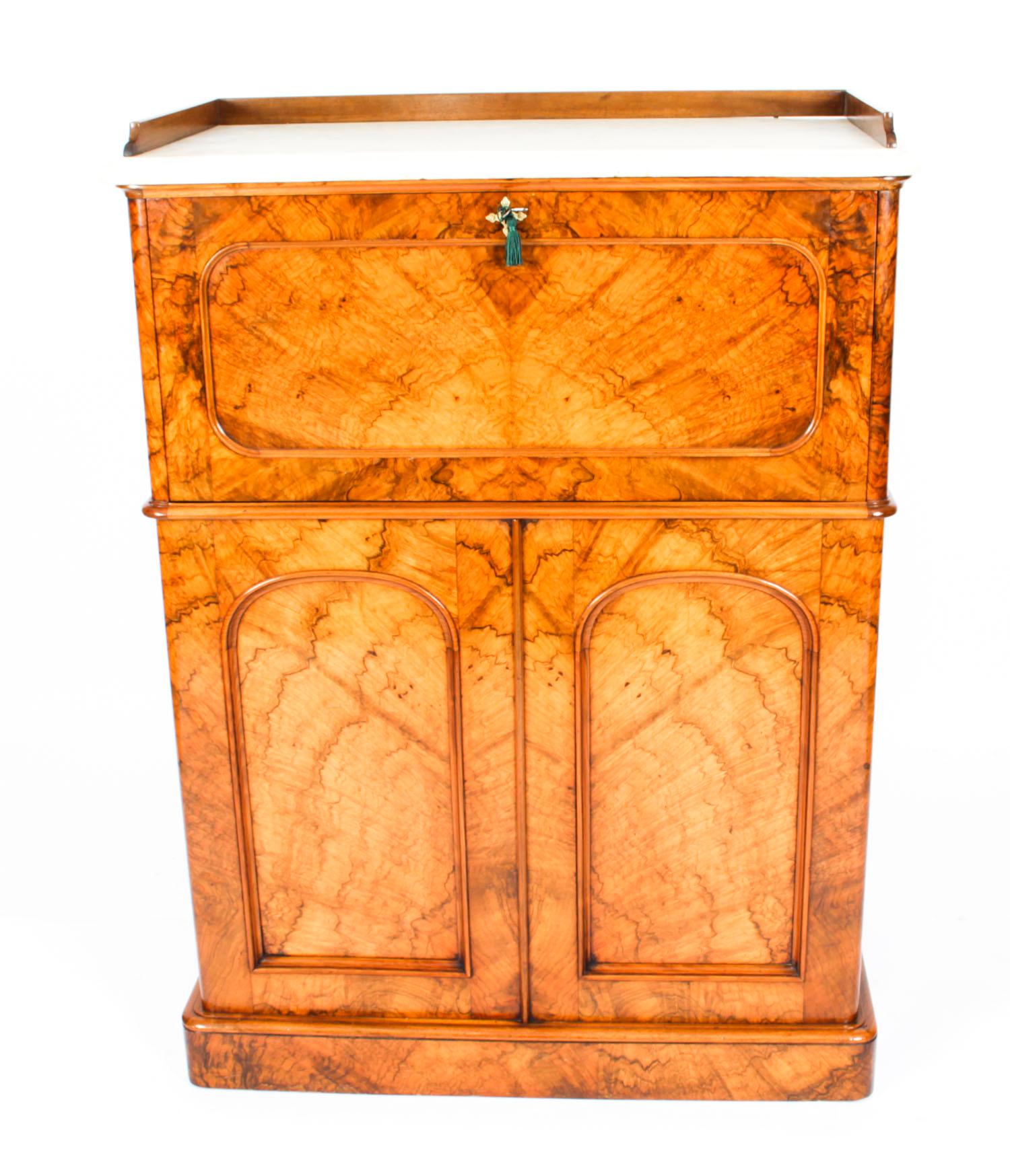 This is a superb quality antique Victorian burr walnut collectors cabinet, circa 1860 in date.
 
The entire piece highlights the unique and truly exceptional pattern and colour of the burr walnut extremely well.
 
The cabinet features a white