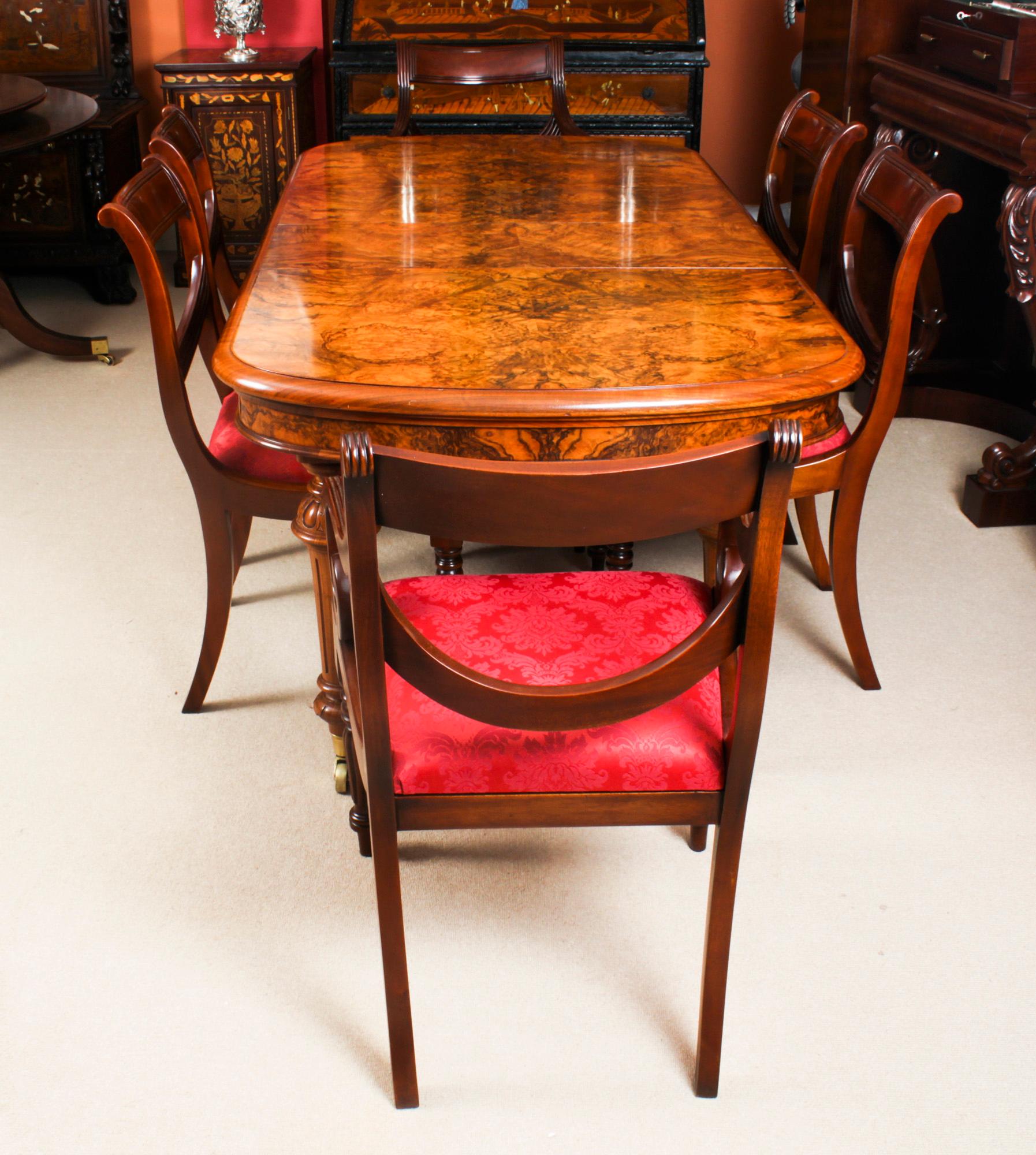 This is a magnificent dining set comprising a rare petite antique Victorian burr walnut extending dining table, C1870 in date with a Vintageset of six dining chairs, late 20th C in date.

The table has been hand crafted from burr walnut and has