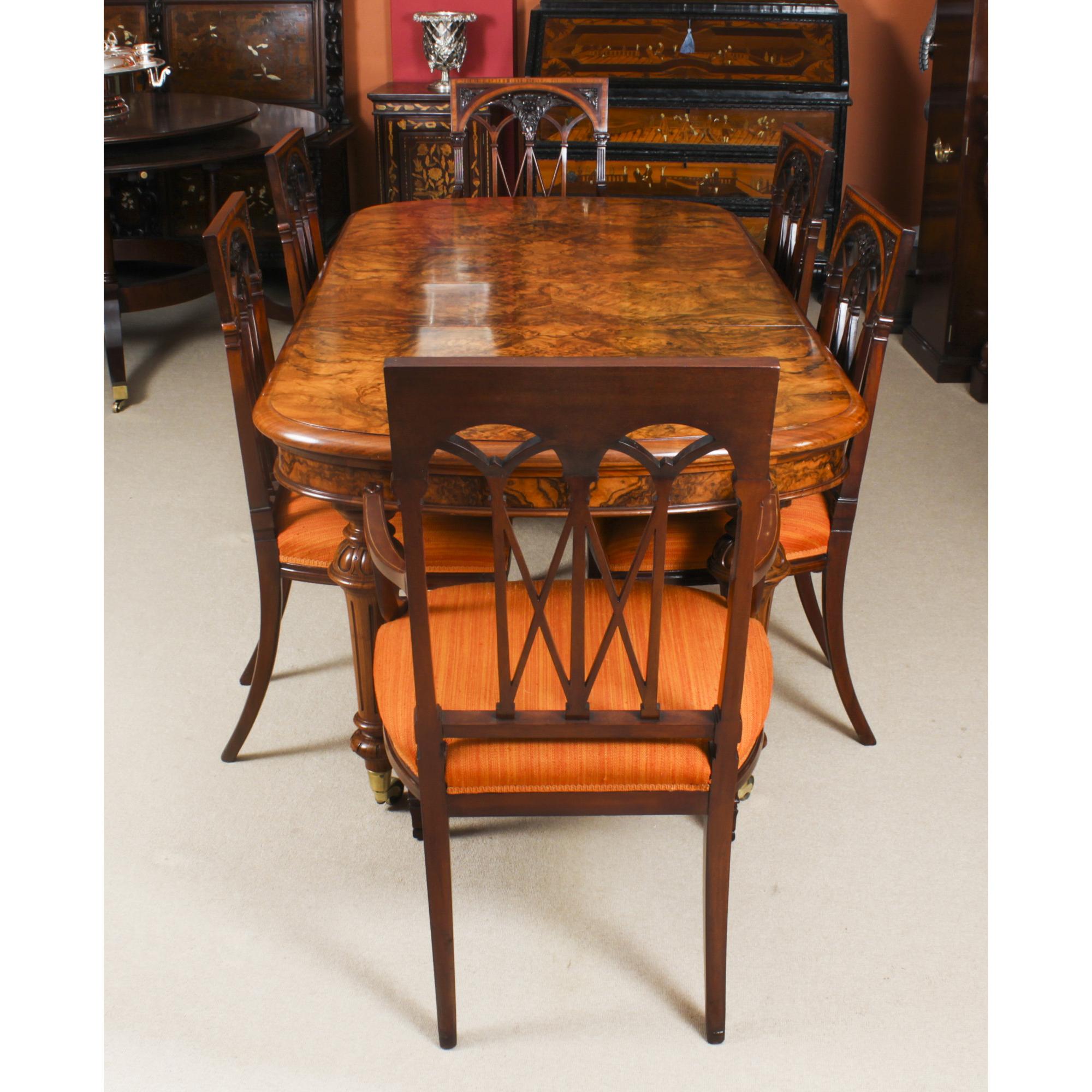 This is a magnificent dining set comprising a rare petite antique Victorian burr walnut extending dining table, C1870 in date with an antique set of six dining chairs, C1900 in date.

The table has been hand crafted from burr walnut and has two