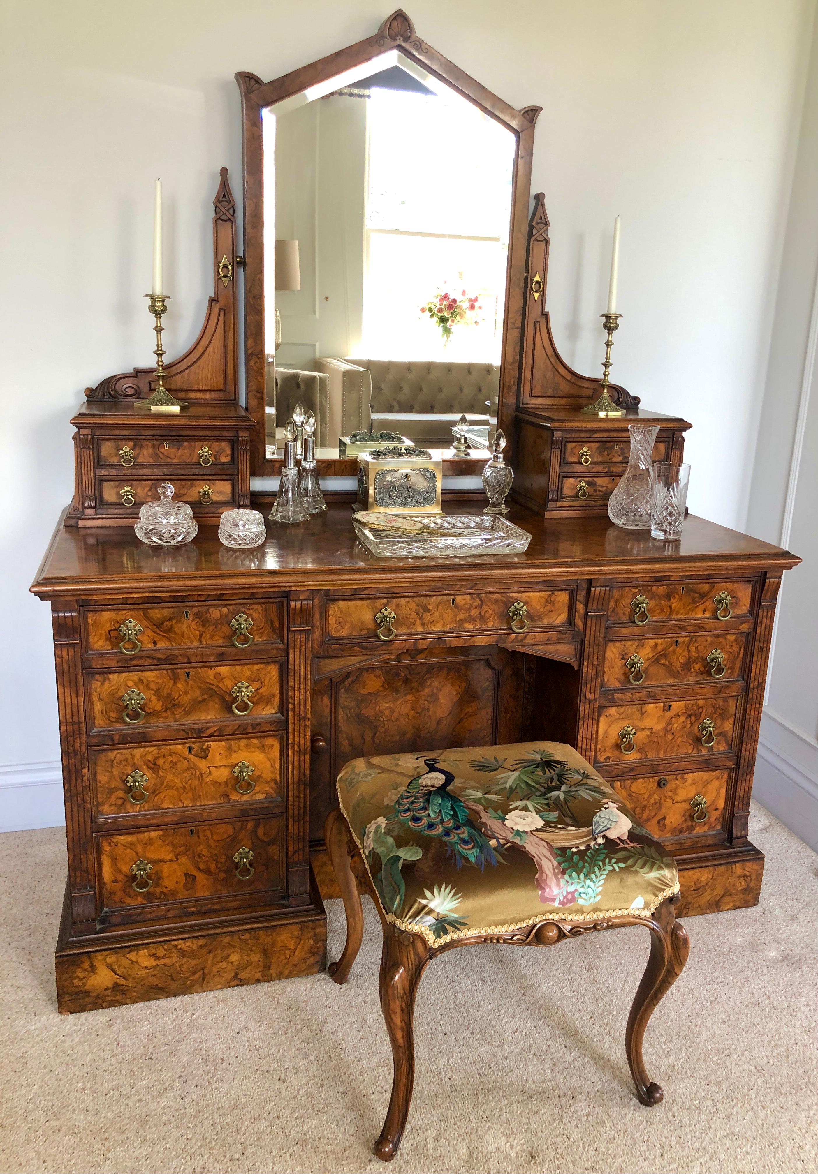 Outstanding quality antique Victorian burr walnut dressing/vanity table by Maple & Co. London who were one of the prime makers and suppliers of furniture to the aristocracy and royalty in the United Kingdom. The top section boasts the beautiful