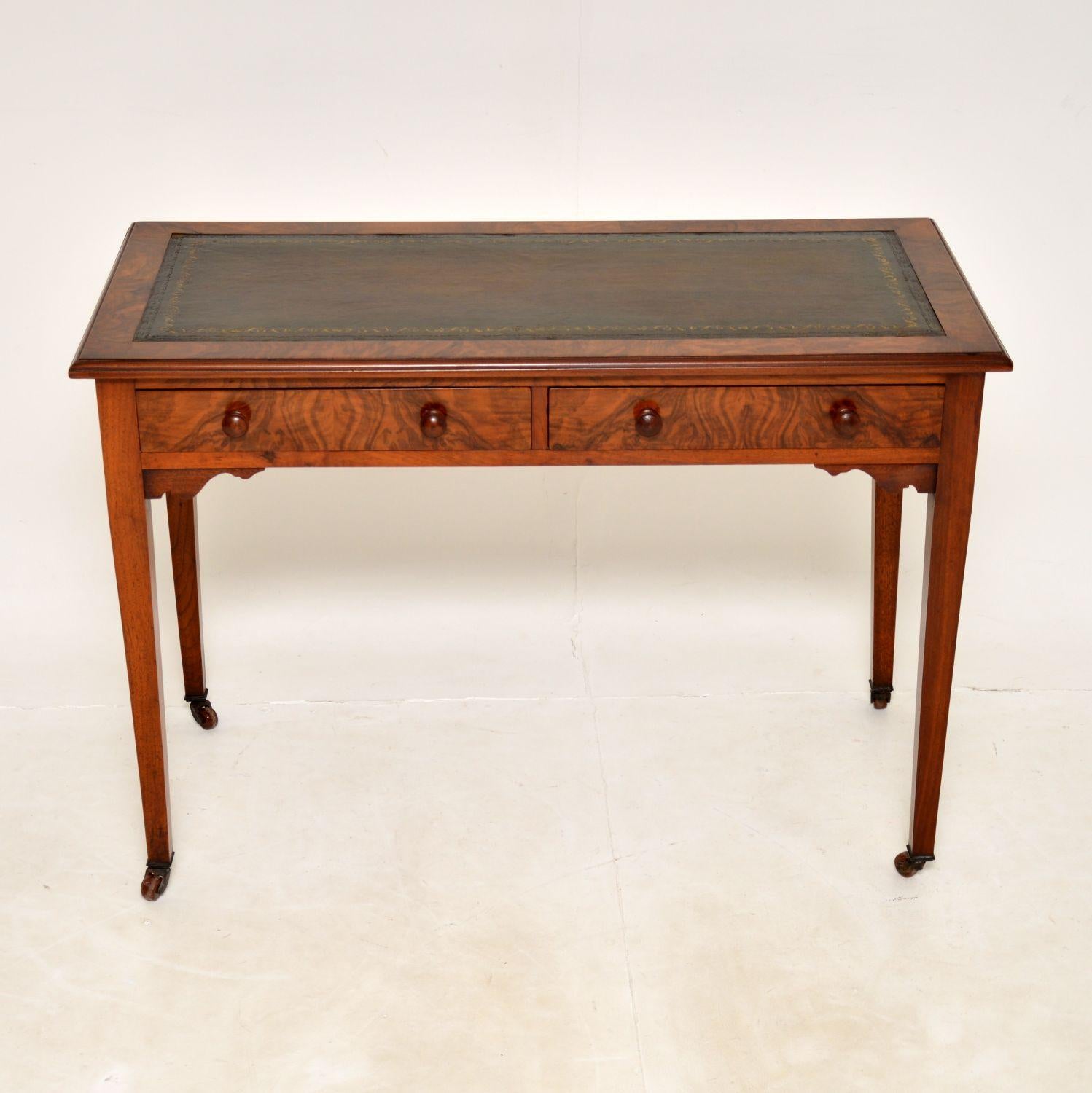 An excellent antique Victorian period leather top writing table in burr walnut. This was made in England, it dates from around the 1880-90’s period.
It is a very useful size and is of excellent quality. The inset leather top is gold tooled and hand