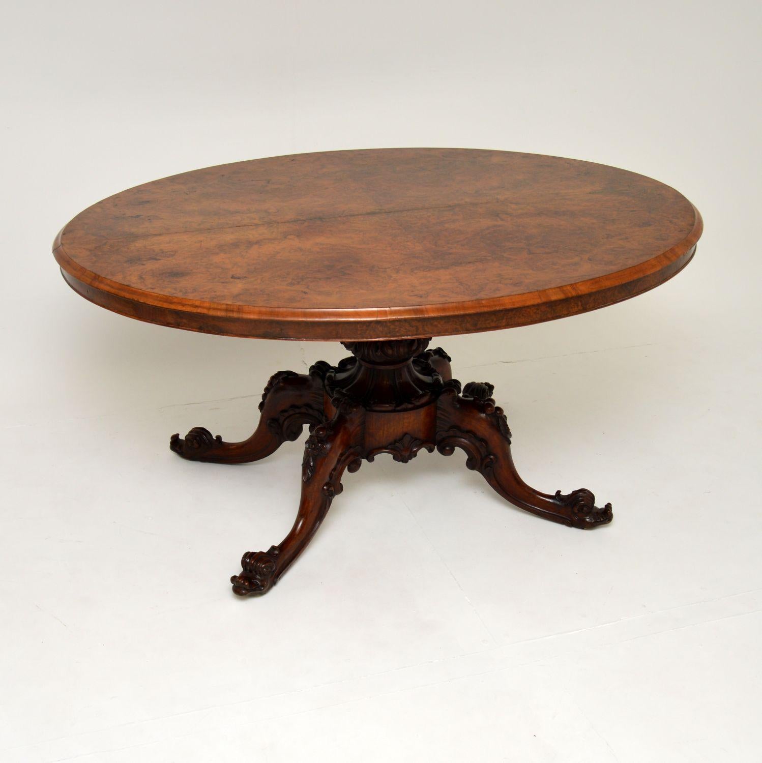 An absolutely stunning antique Victorian walnut breakfast table of the highest order. This was made in England, it dates from the 1860-1880 period.

This is one of the finest quality examples we have ever come across, the design of the base is