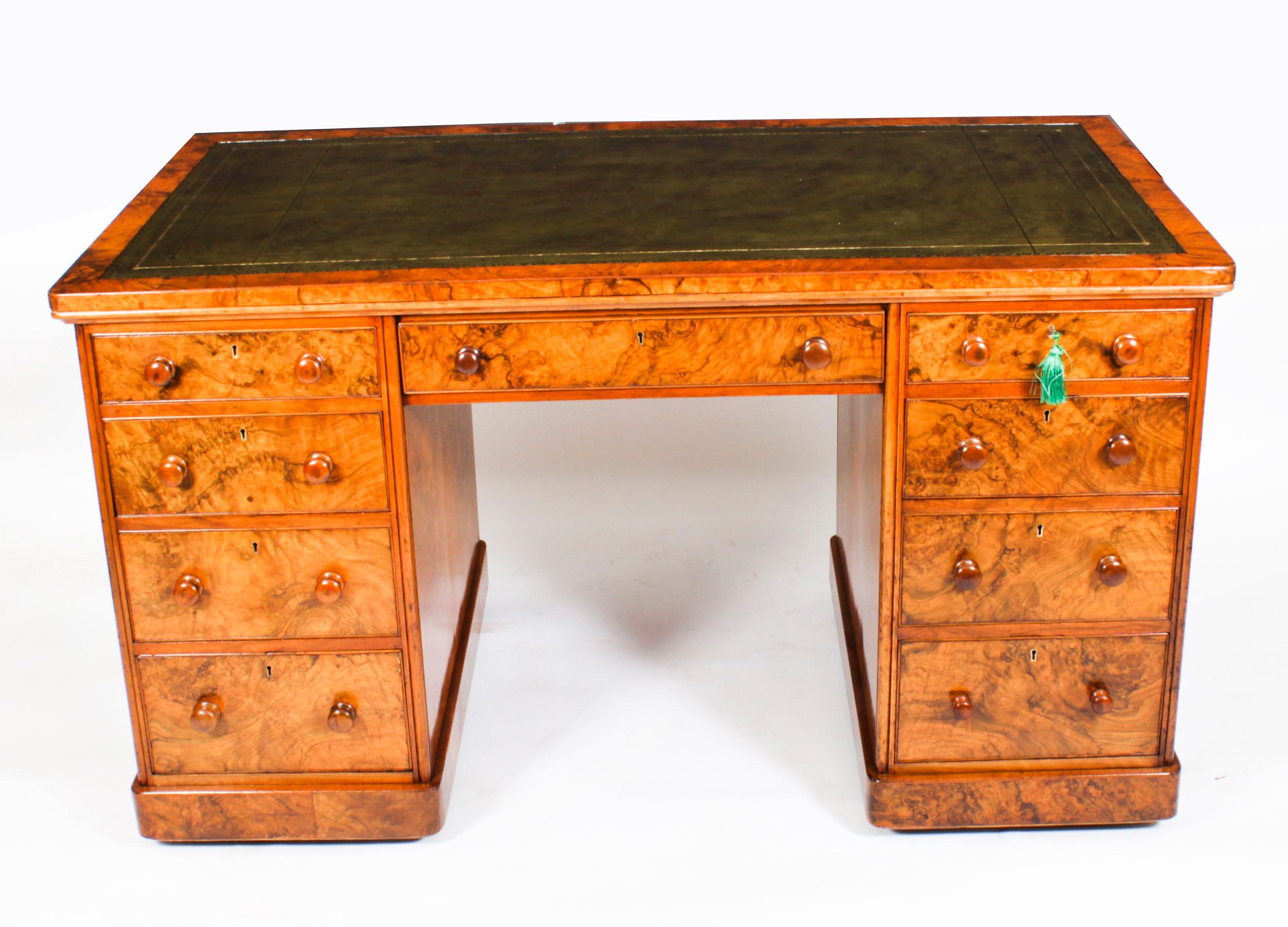 This is a fine and very rare antique Victorian burr walnut twin pedestal partners desk, Circa 1860 in date.
 
It is made from fabulous burr walnut, the rectangular top with a fabulous inset gold tooled green leather writing surface.
 
One side