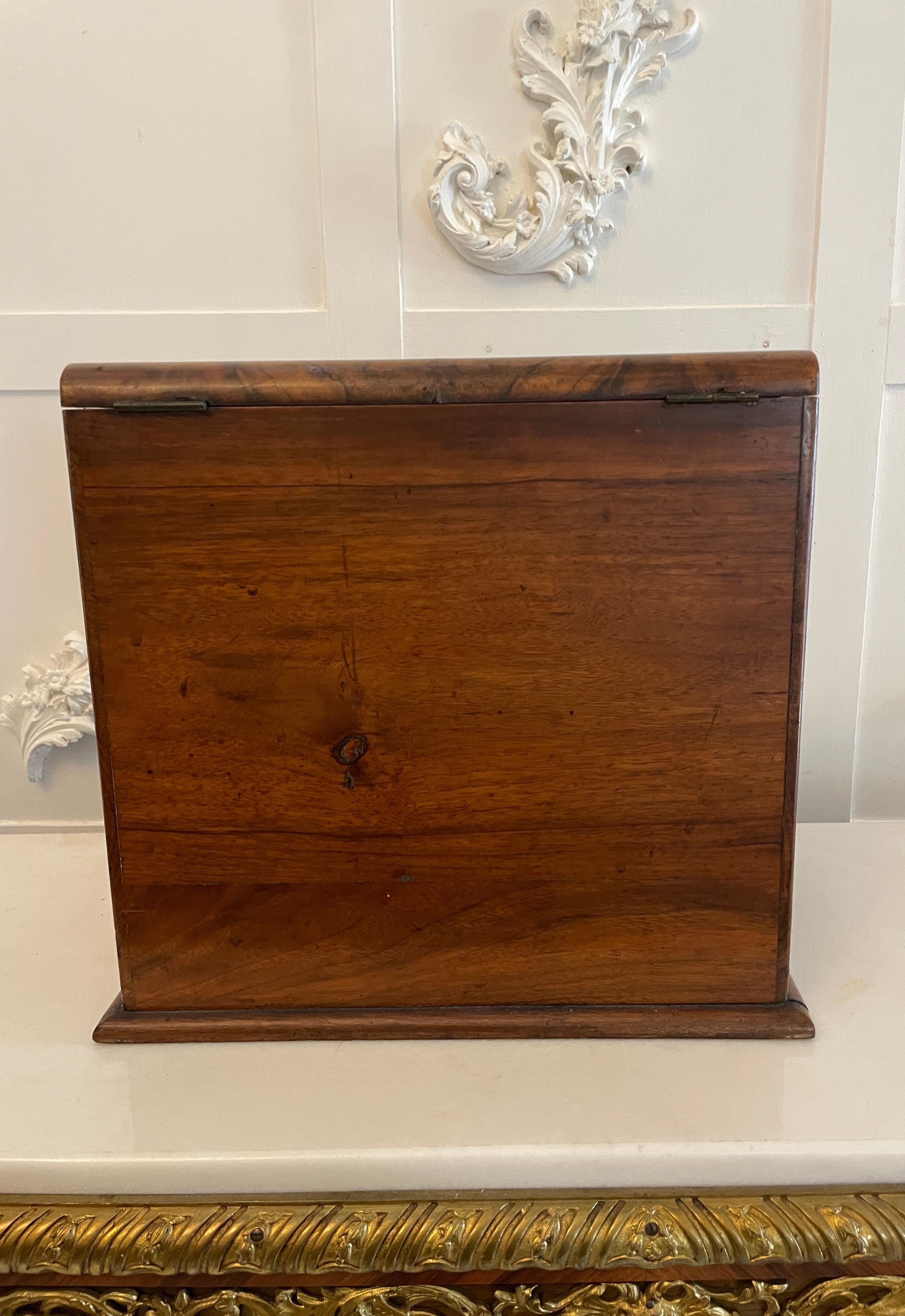 Antique Victorian burr walnut stationery box having two impressive burr walnut doors opening to reveal the most devine fully fitted interior comprising of an adjustable day, date and month calendar, shaped letter rack, pen tray, sliding notepad, one