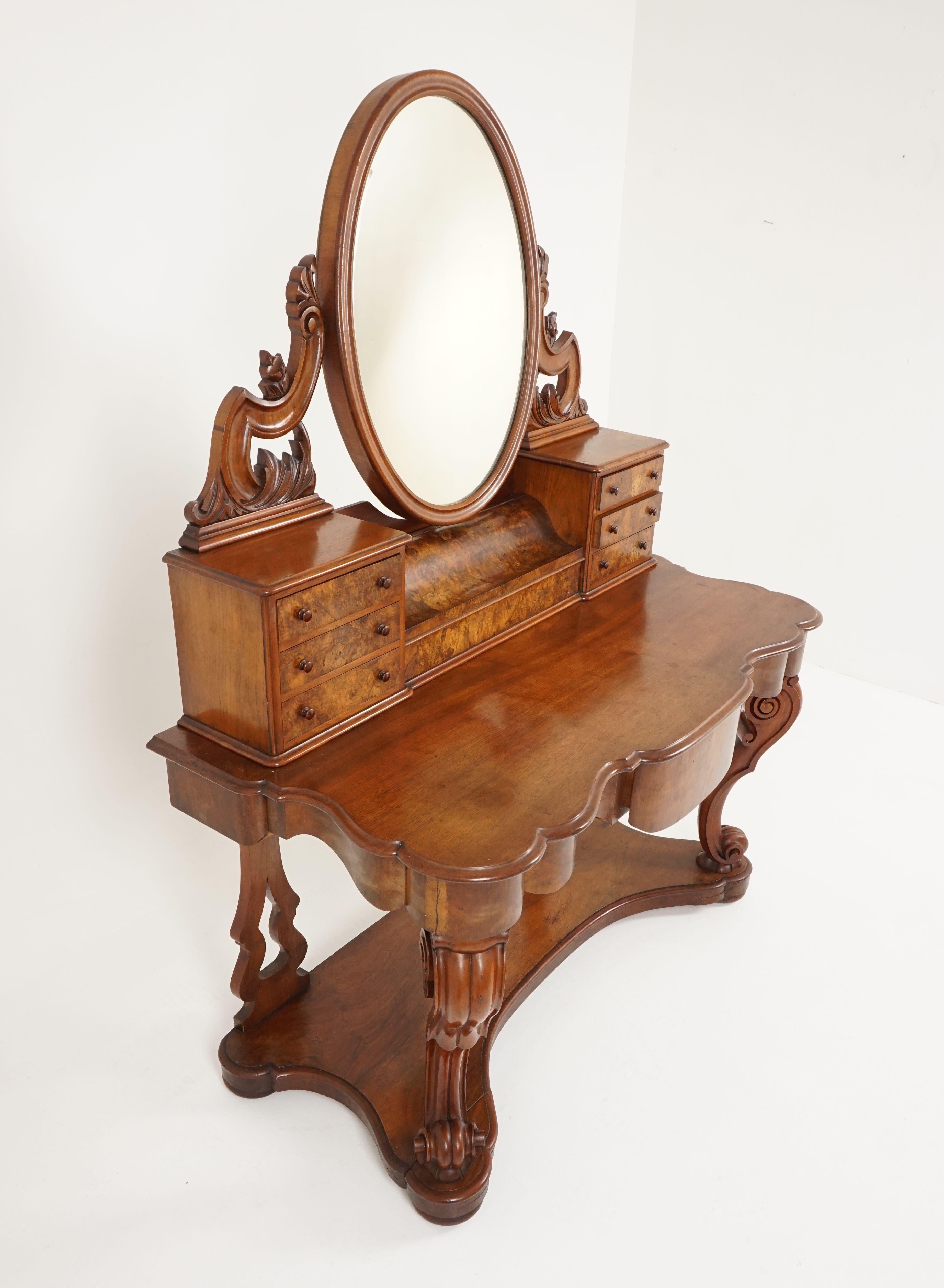 Antique Victorian burr walnut vanity dressing table, Duchess dresser, Scotland, 1870, B2125

Scotland 1870
Solid walnut and veneer
Original finish
The table top has a removeable and tiltable mirror held in place with crisp carved