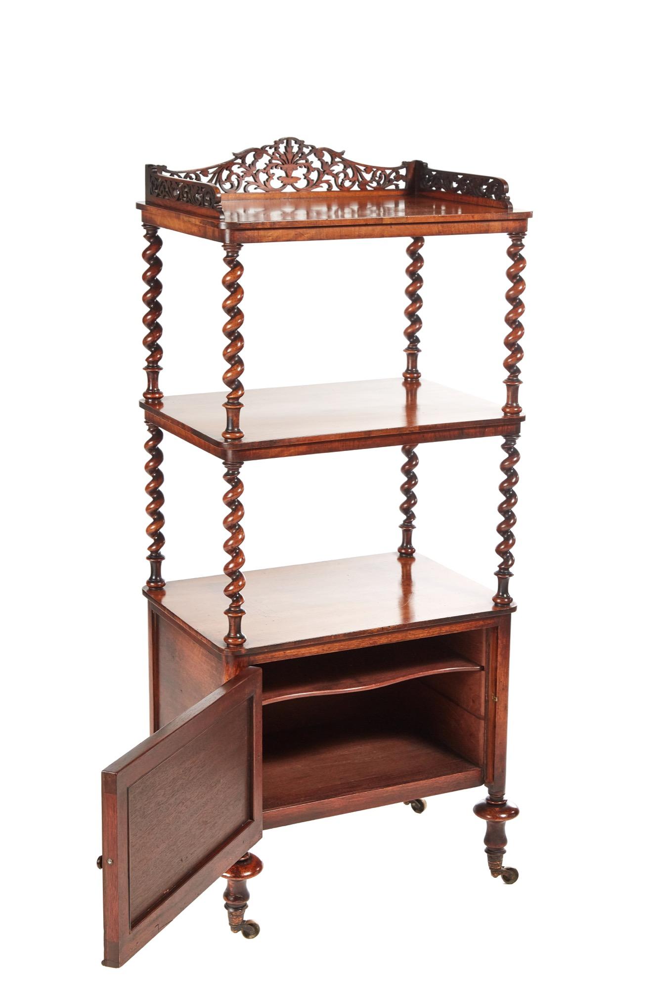 Beautifully crafted and designed 19th century Victorian burr walnut whatnot. The top having a very pretty shaped fretwork gallery, wonderful coloured walnut shelves, supported by eight elegant solid walnut barley twist columns. The cupboard door has