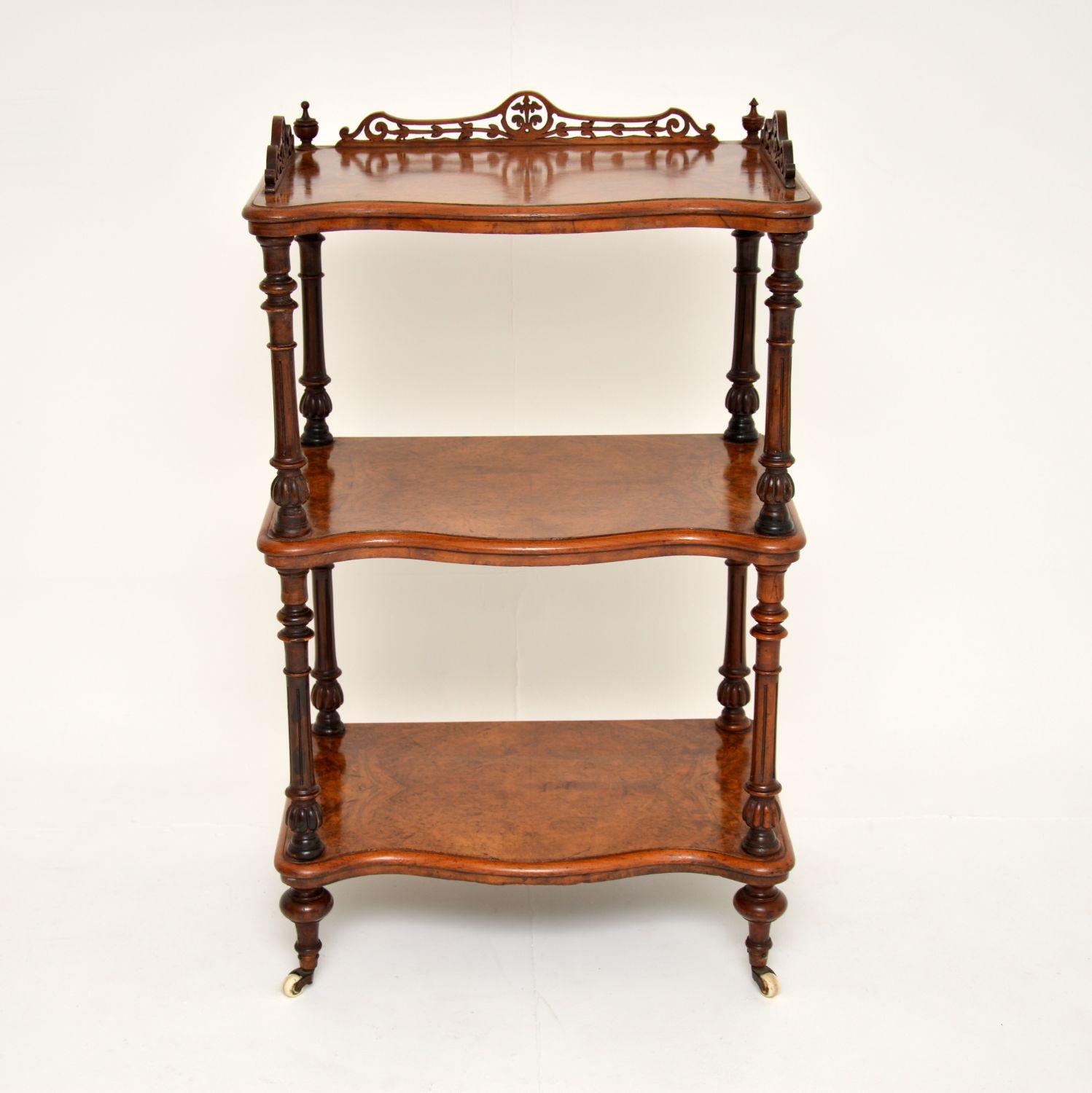 A gorgeous antique Victorian period What-Not stand in burr walnut. This was made in England, it dates from around the 1860’s.

The quality is fantastic, it is a very useful and sturdy item. There are stunning burr walnut grain patterns, the legs