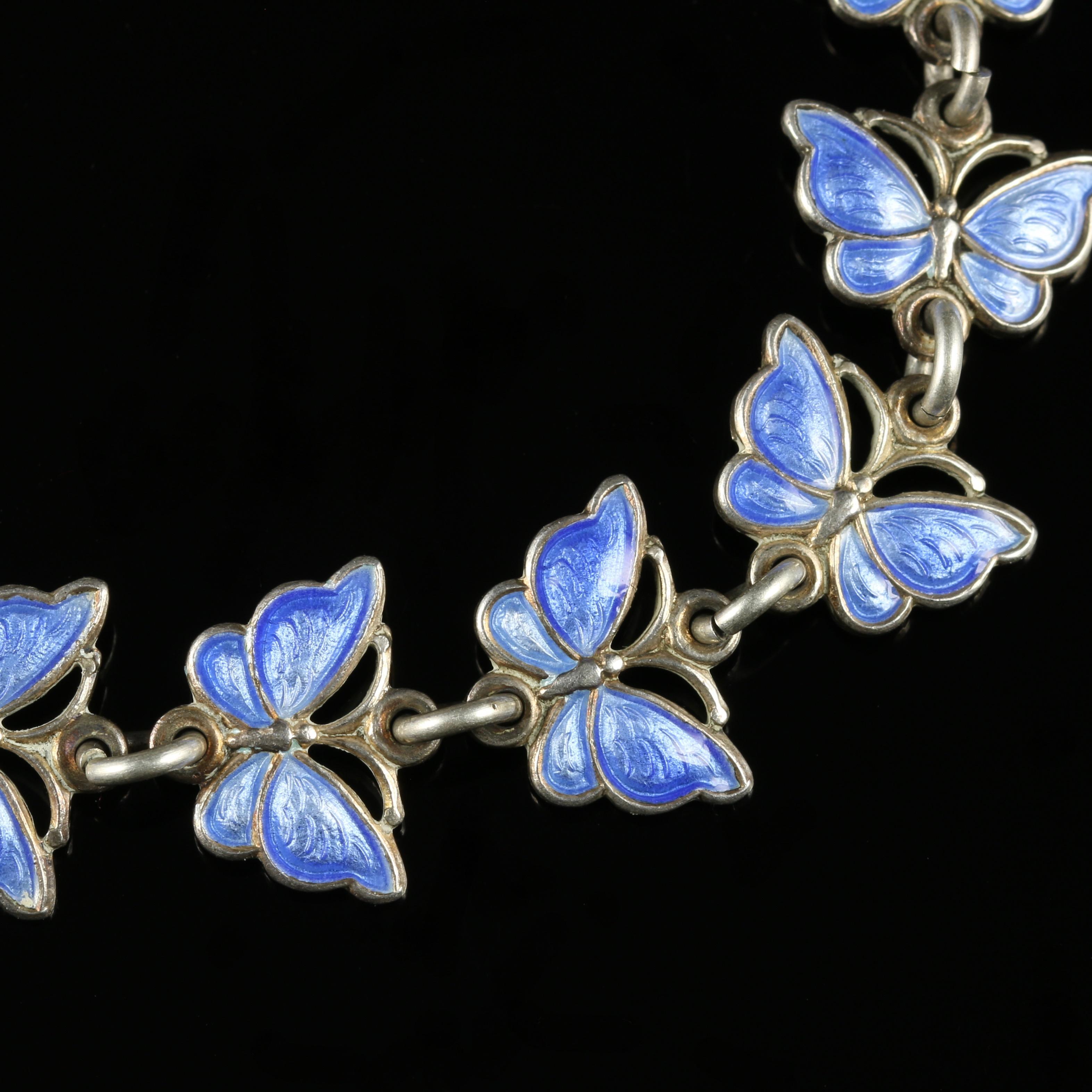 For more details please click continue reading down below...

This gorgeous genuine Antique Victorian bracelet is Circa 1900.

Set in Silver, this bracelet is adorned with 13 beautiful blue Enamel butterflies.

The butterflies all flutter in the