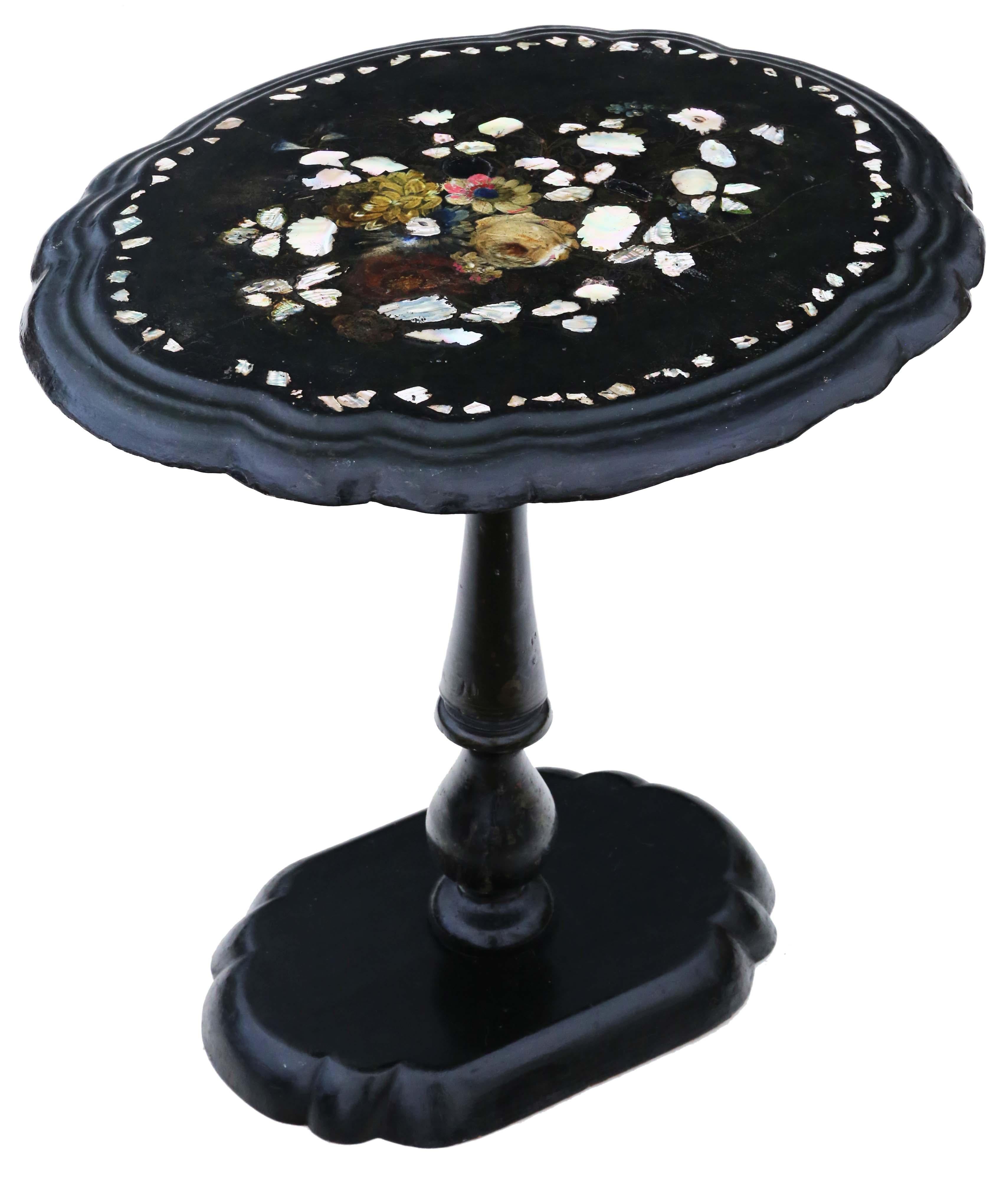 Antique Victorian C1880 hand decorated inlaid papier mache tea supper wine table with a tilt top.

This is a lovely table, that is full of age, charm and character.

Rare and attractive.

The table has no loose joints, no woodworm and the