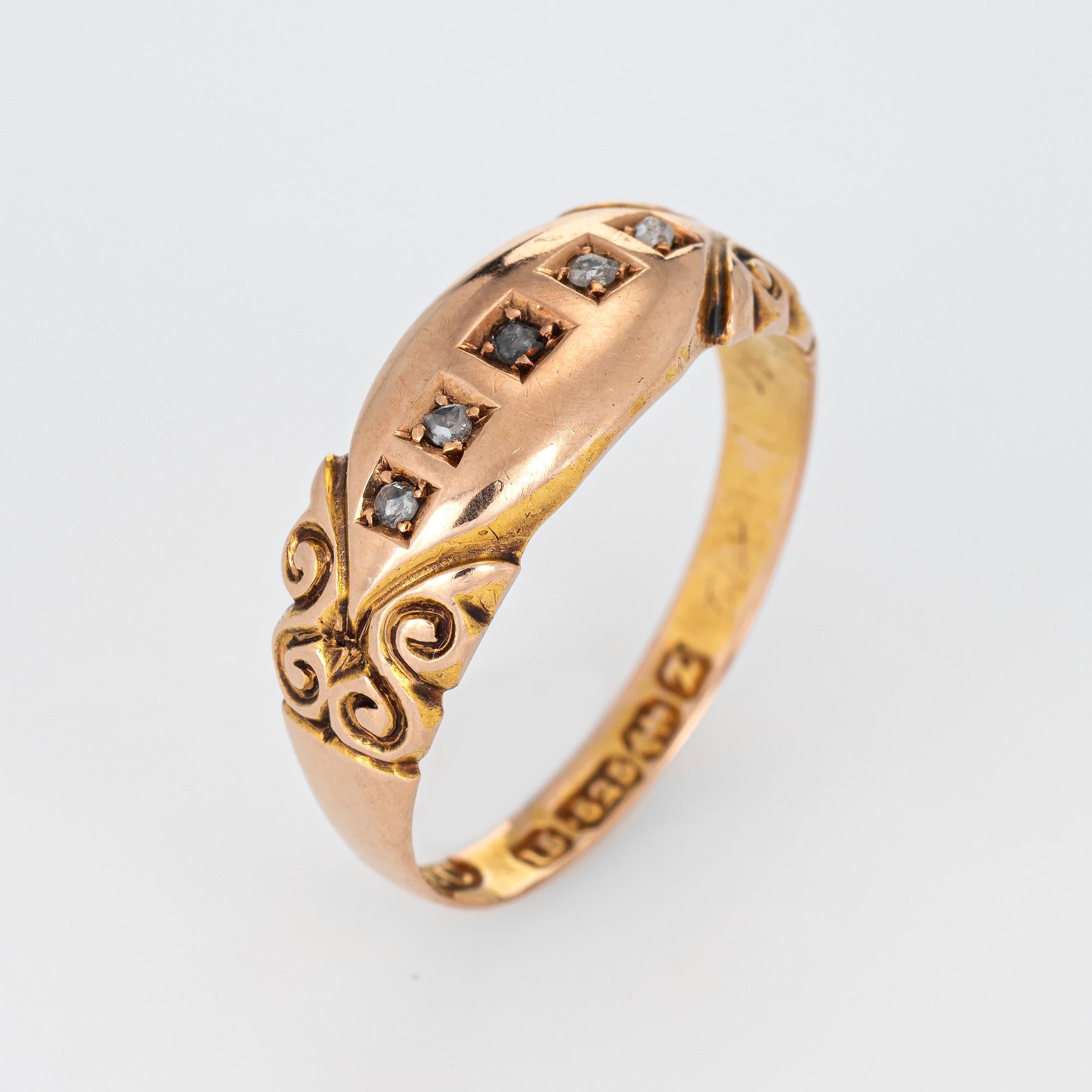 Antique Victorian gypsy band (circa 1899), crafted in 15 karat rose gold. 

Five old rose cut diamonds total an estimated 0.05 carats (estimated at L-M color and I1 clarity).   

The old rose cut diamonds are set into a five stone setting with