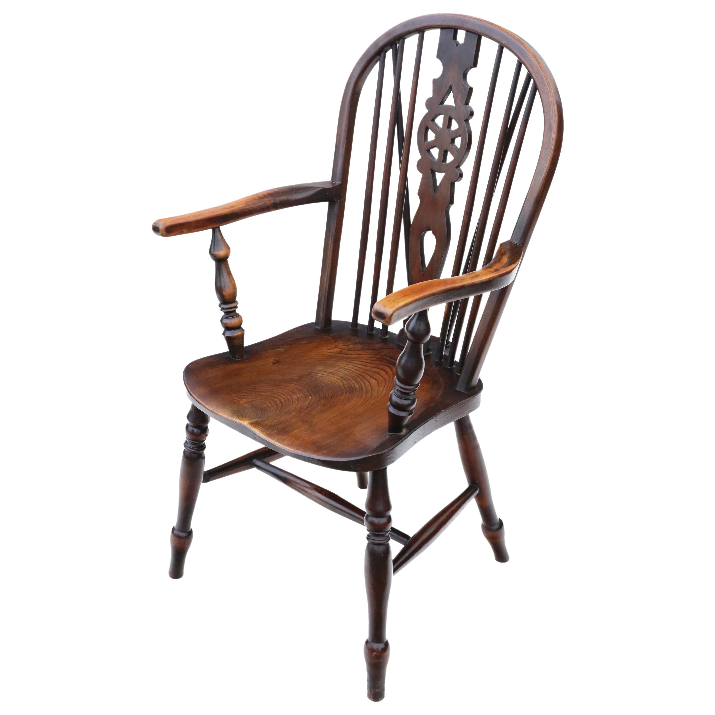 Antique English elm and ash Windsor chair with crinoline stretcher. at