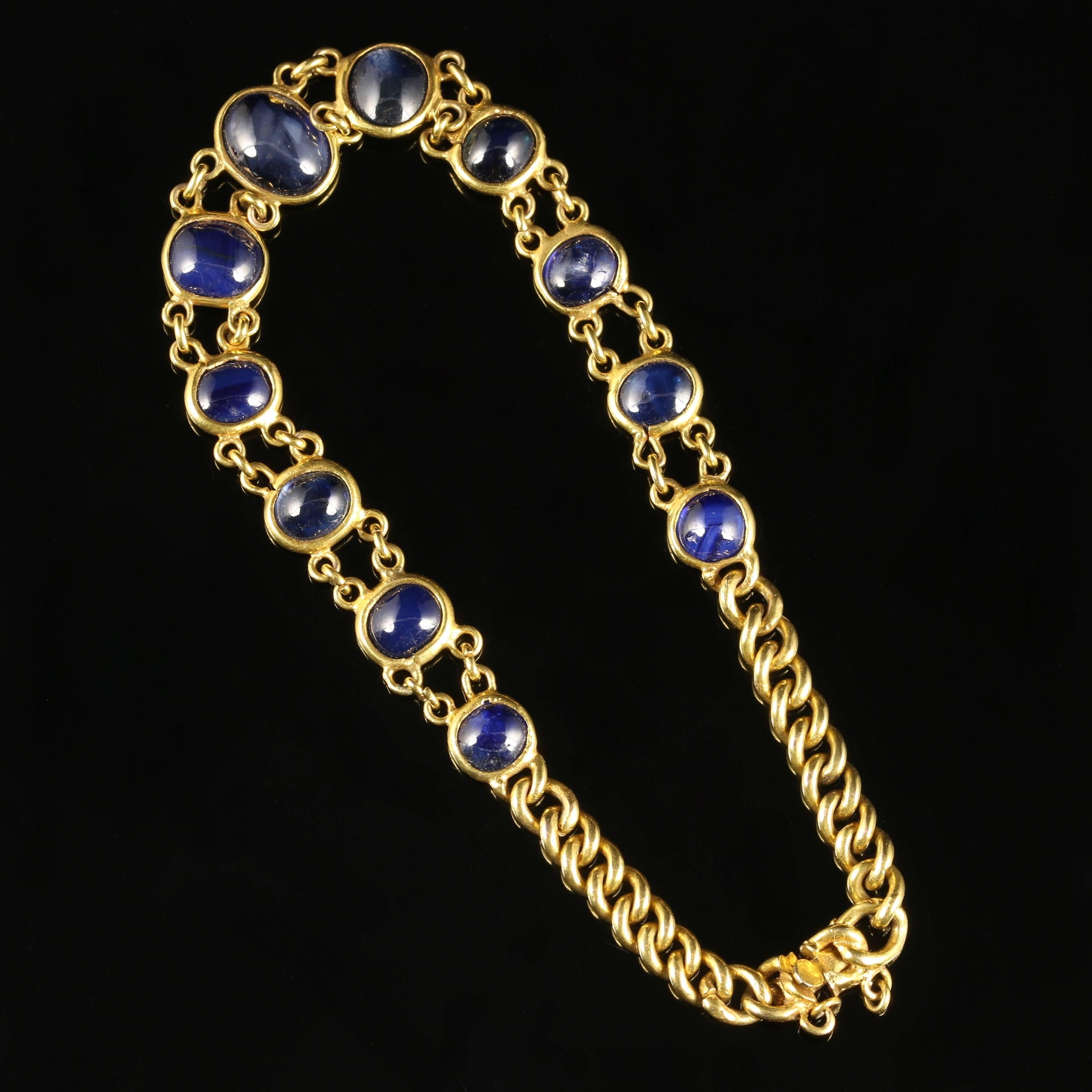 For more details please click continue reading down below...

This fabulous Antique Victorian Sapphire bracelet is Circa 1900.

Set with eleven graduated cabochon Sapphires which adorn this spectacular bracelet.

Sapphire is the symbol of feelings