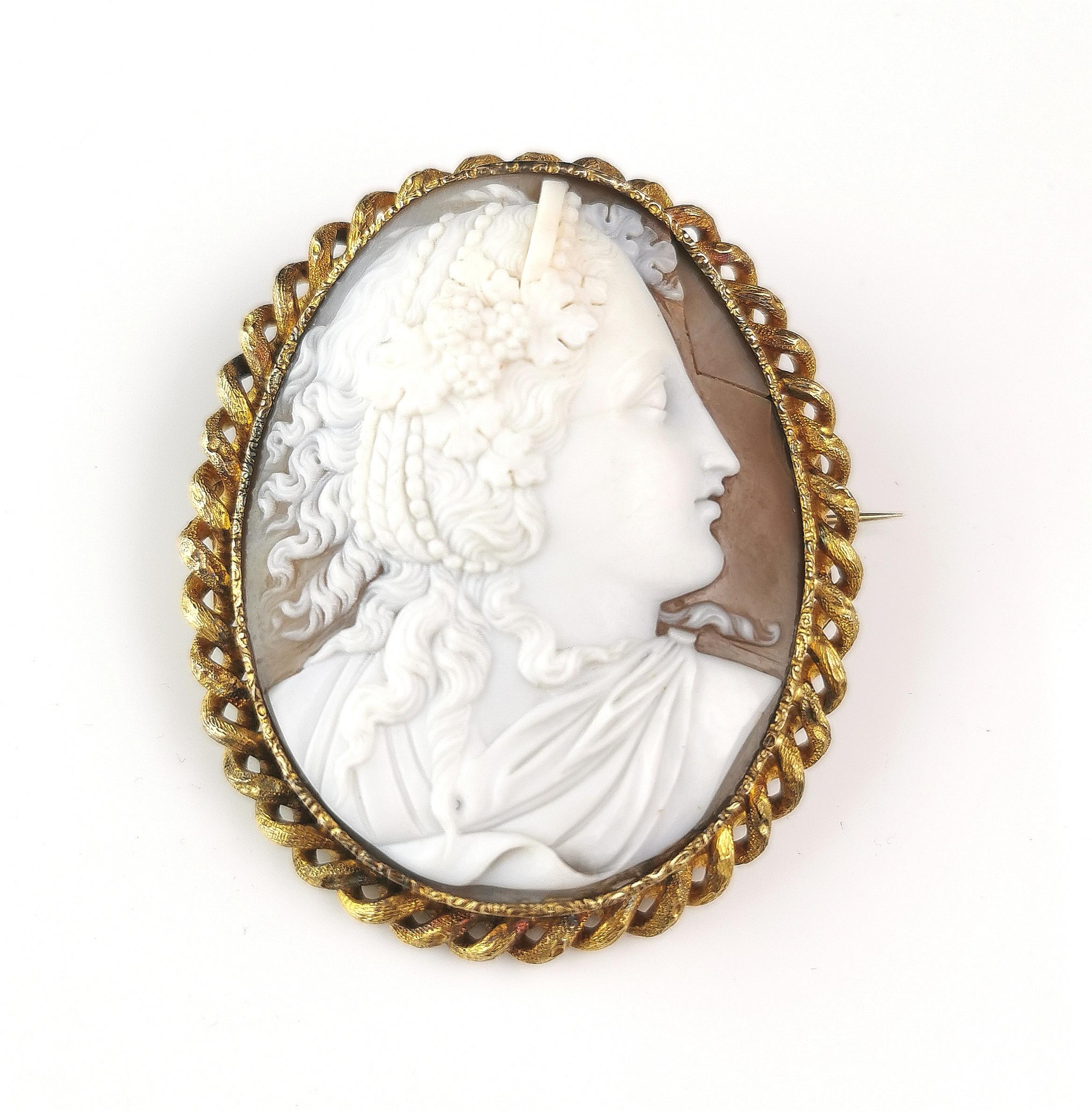 A beautiful antique Victorian era cameo brooch.

Very finely carved from bullmouth shell it features a beautiful Bacchante and the detailing is really very well done, certainly a more finely carved cameo and it's always a real treat to find